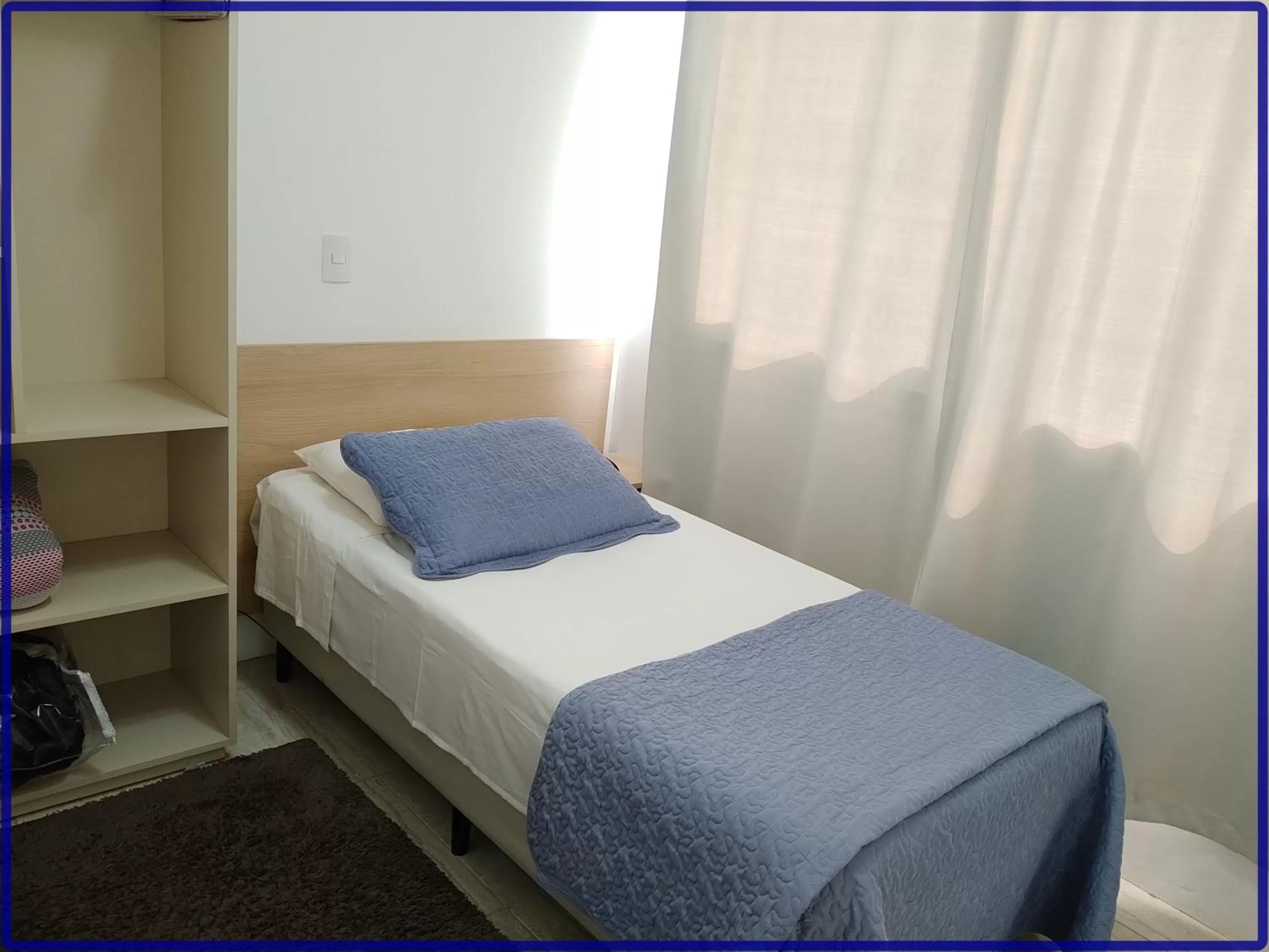 Bed in Hotel Anjos LTDA