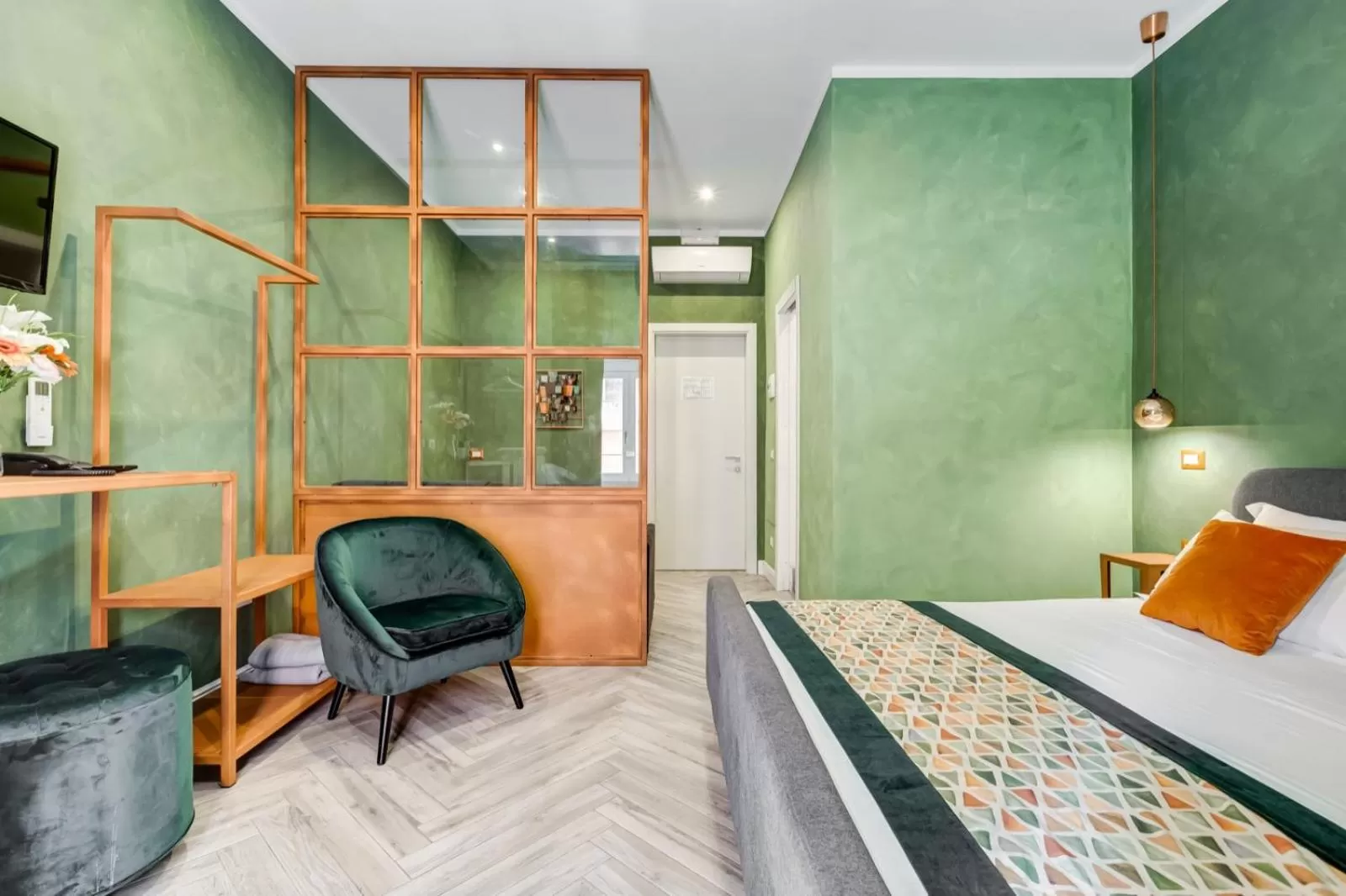 Bed in Ripetta Deluxe Suites