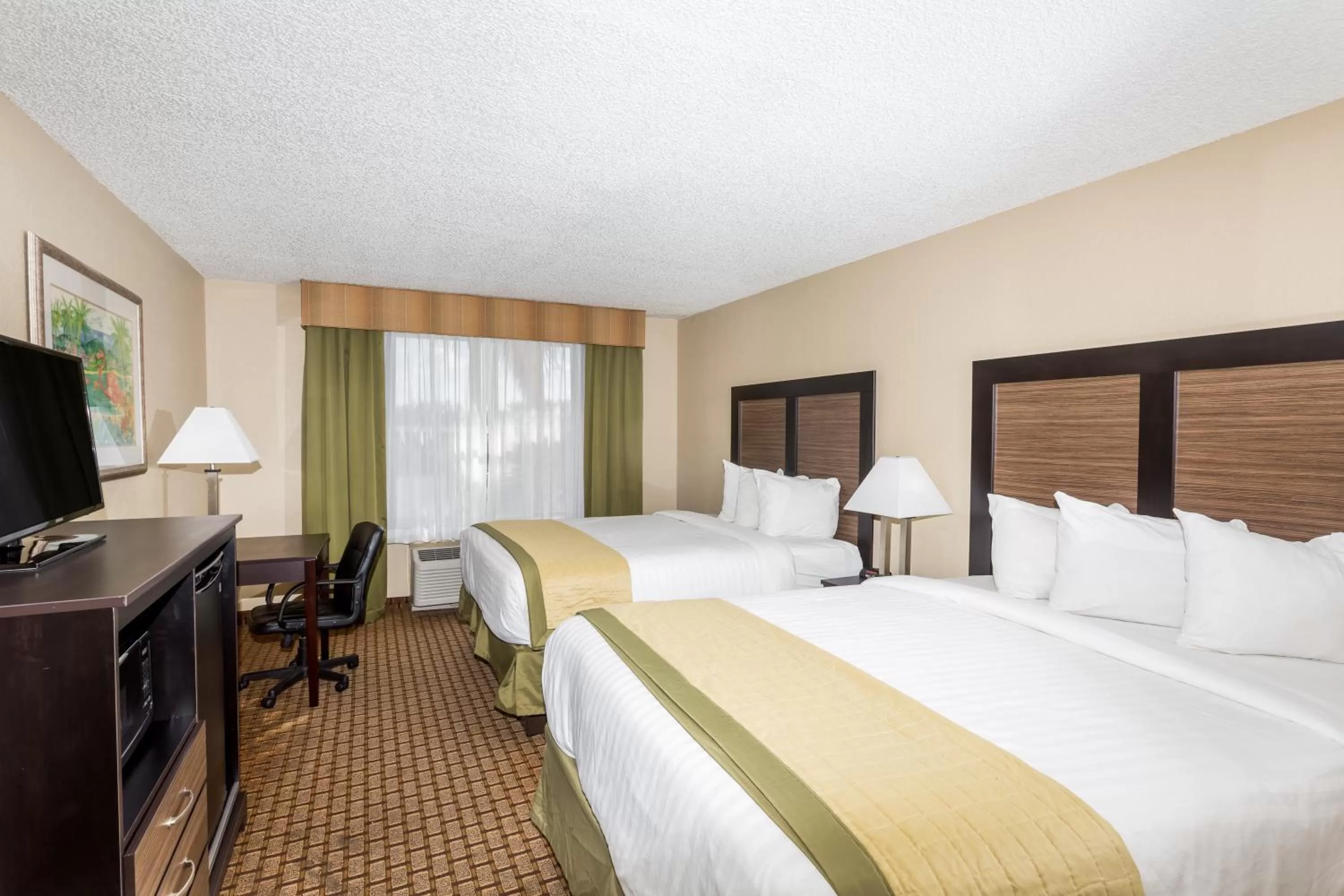 Photo of the whole room, Bed in Baymont by Wyndham Fort Myers Airport