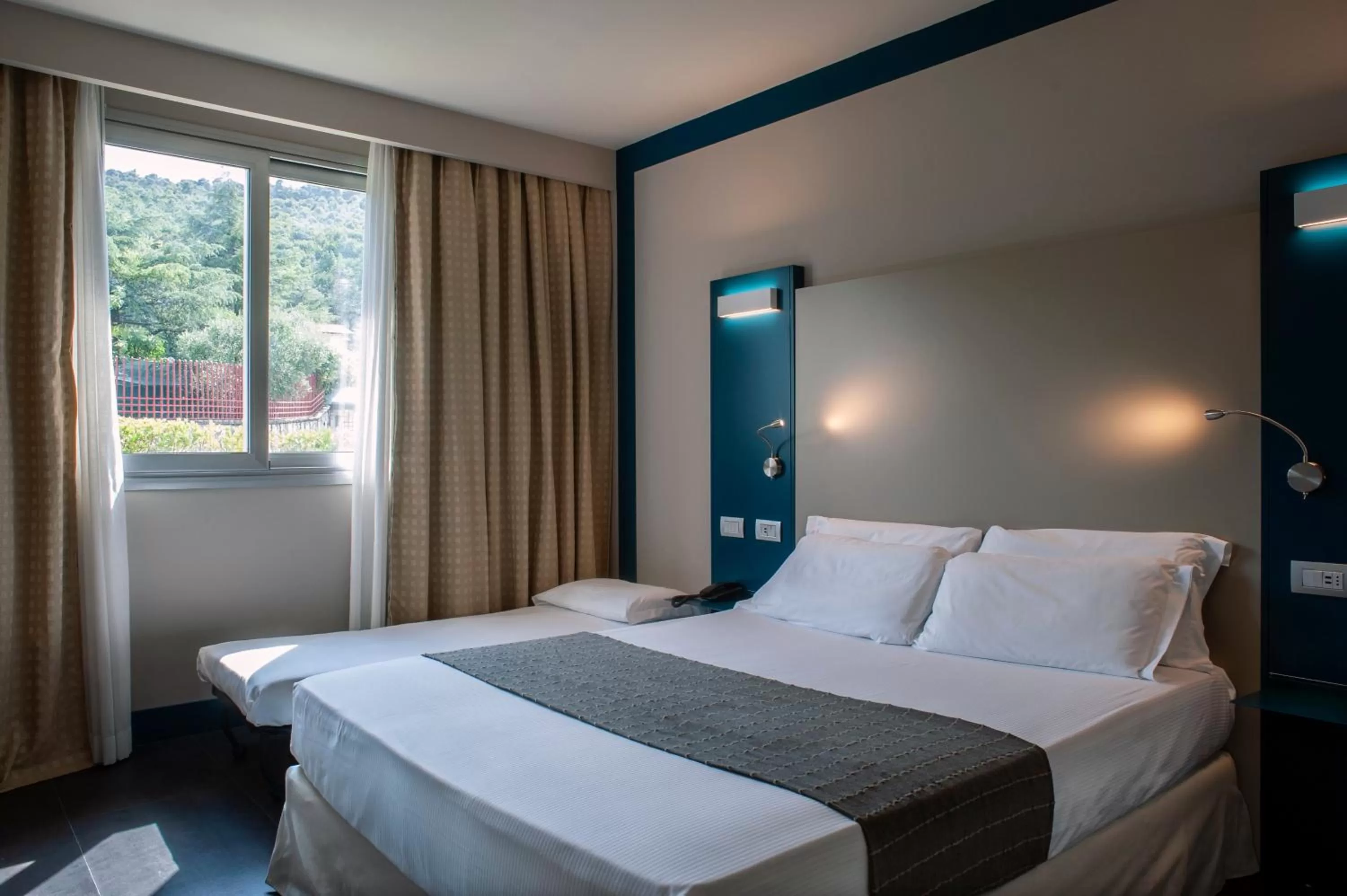 Bedroom, Bed in La Meridiana Bleisure Hotel