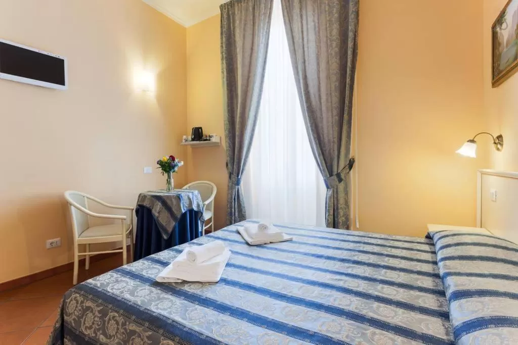 Photo of the whole room, Bed in Vatican Town