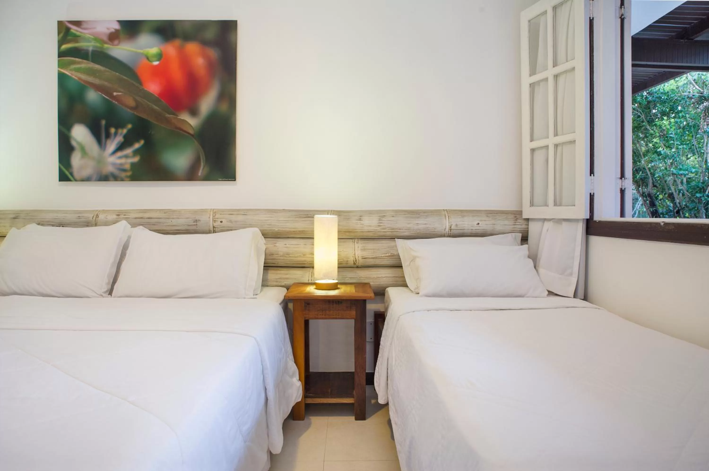 Bed in Pousada Vila Pitanga