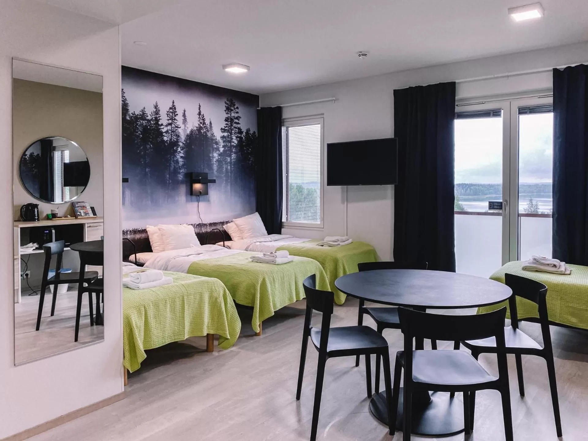 Bed in Hotelli Kuohu Kangasala - Hotel and Apartments by UHANDA