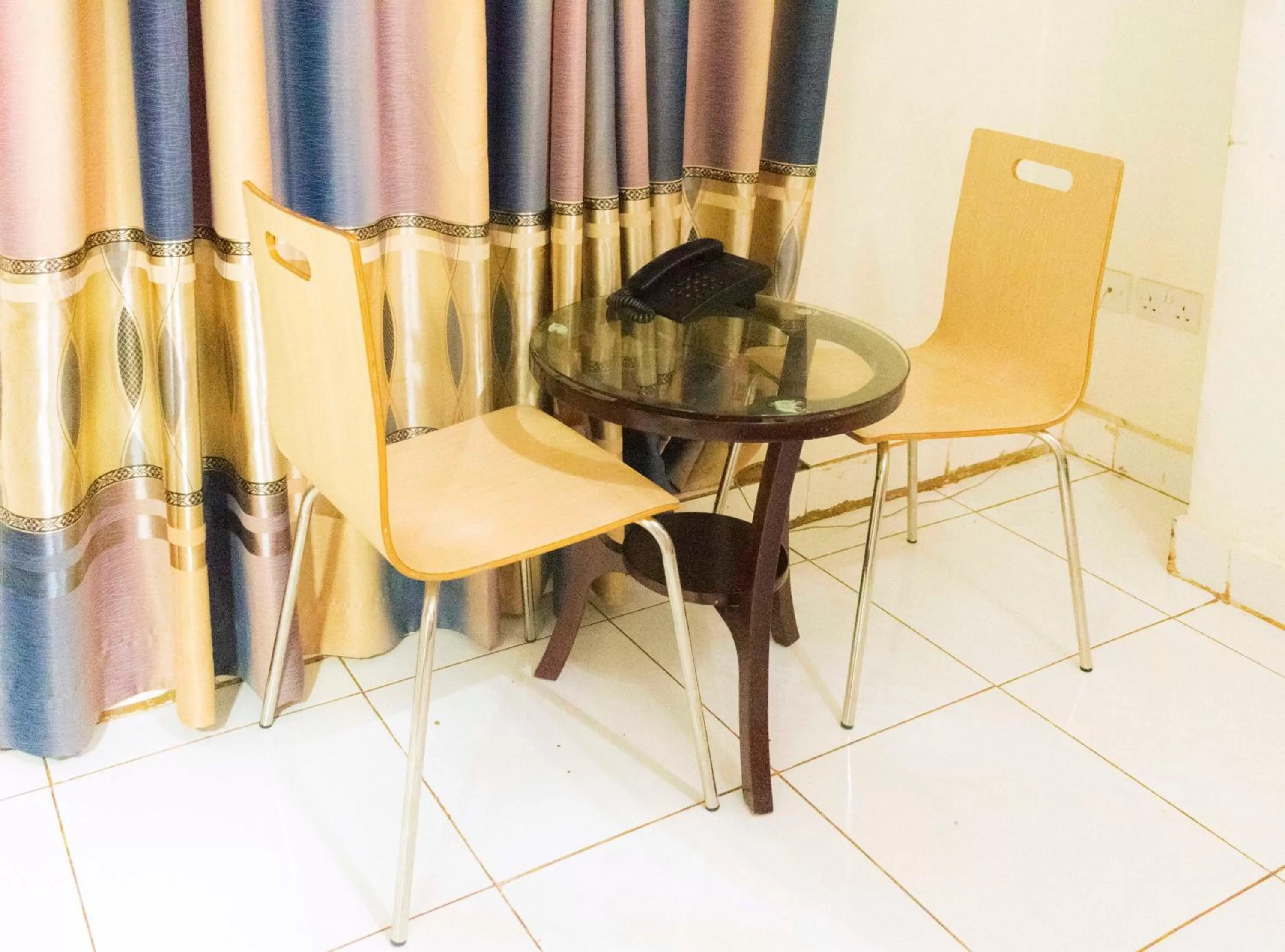 Seating area in Sunrise Hotel Kampala