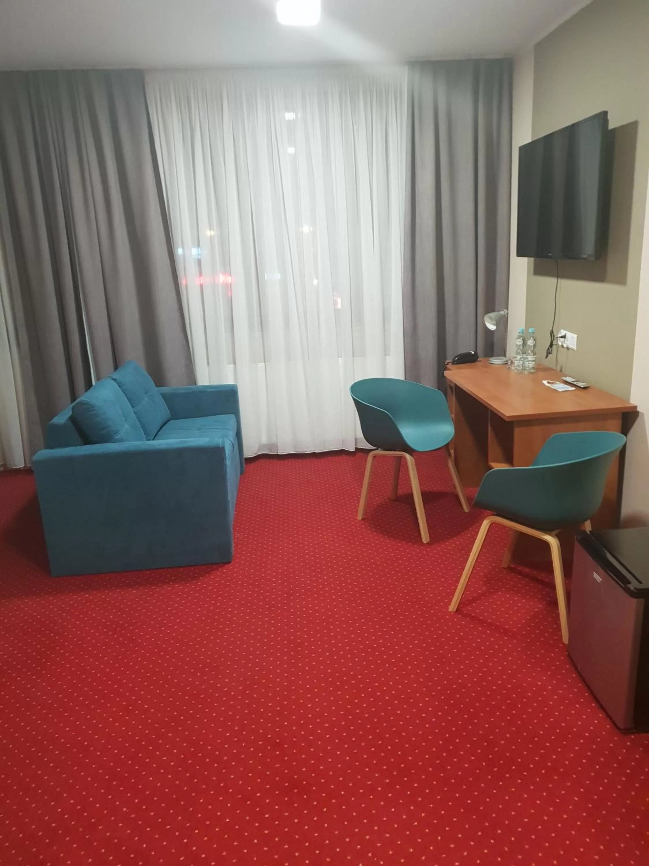 Photo of the whole room in Carina Hotel