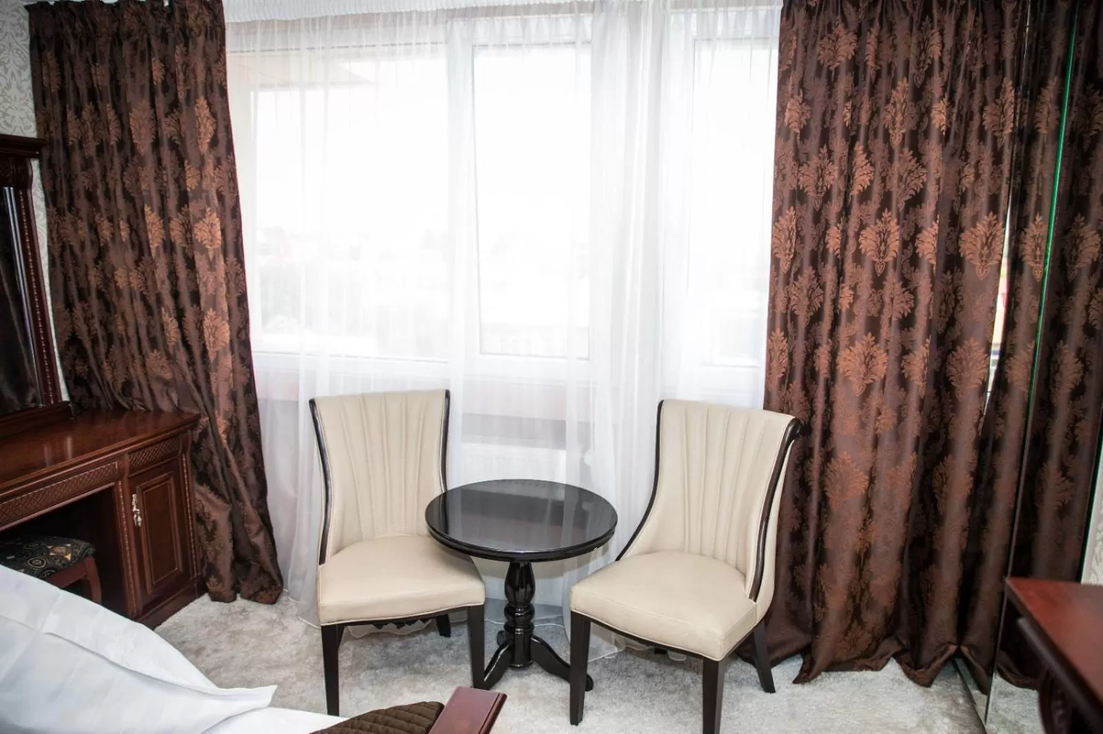 Seating area, Bed in Hotel Megalos