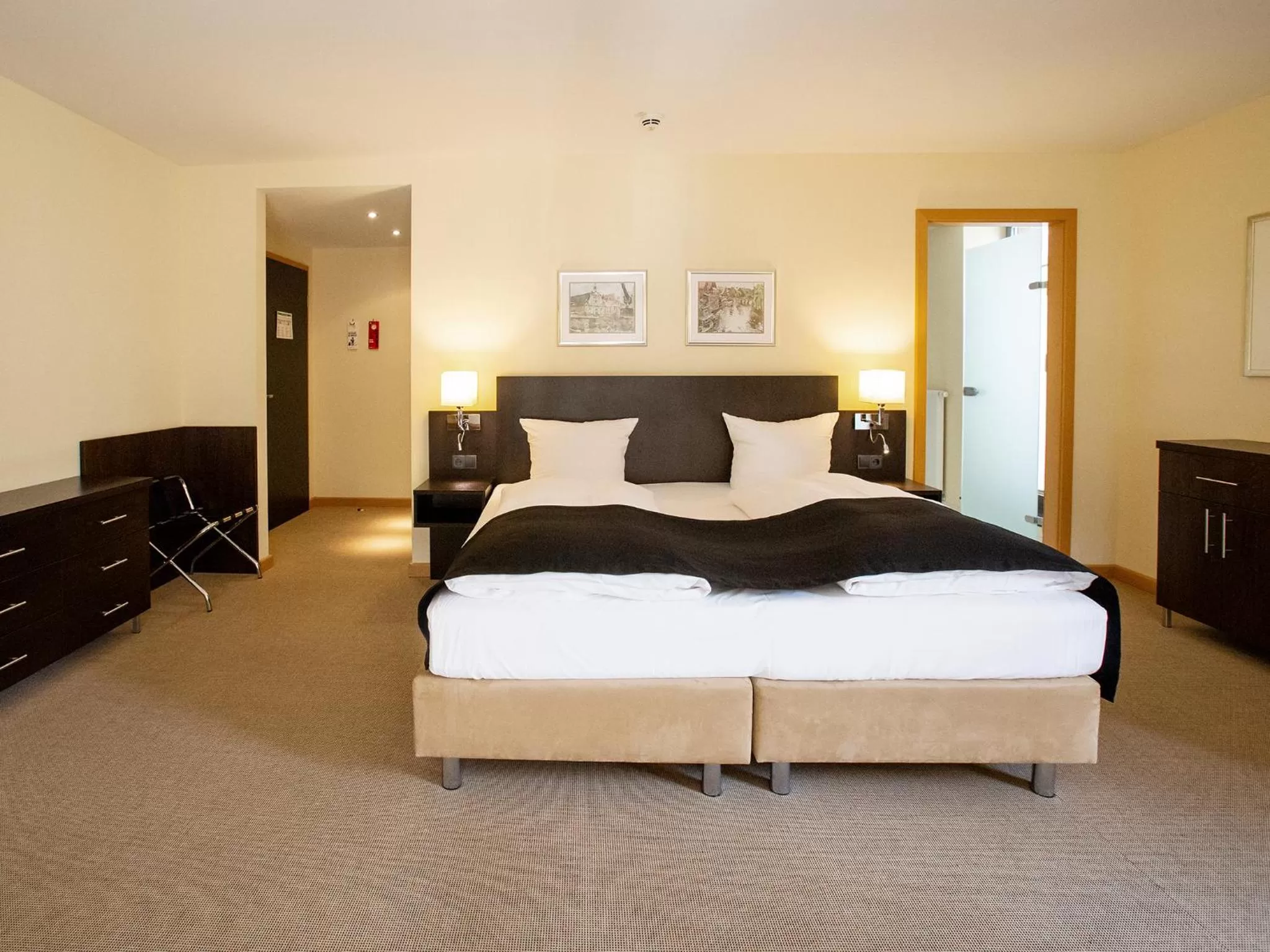 Photo of the whole room, Bed in DORMERO Hotel Altes Kaufhaus Lüneburg