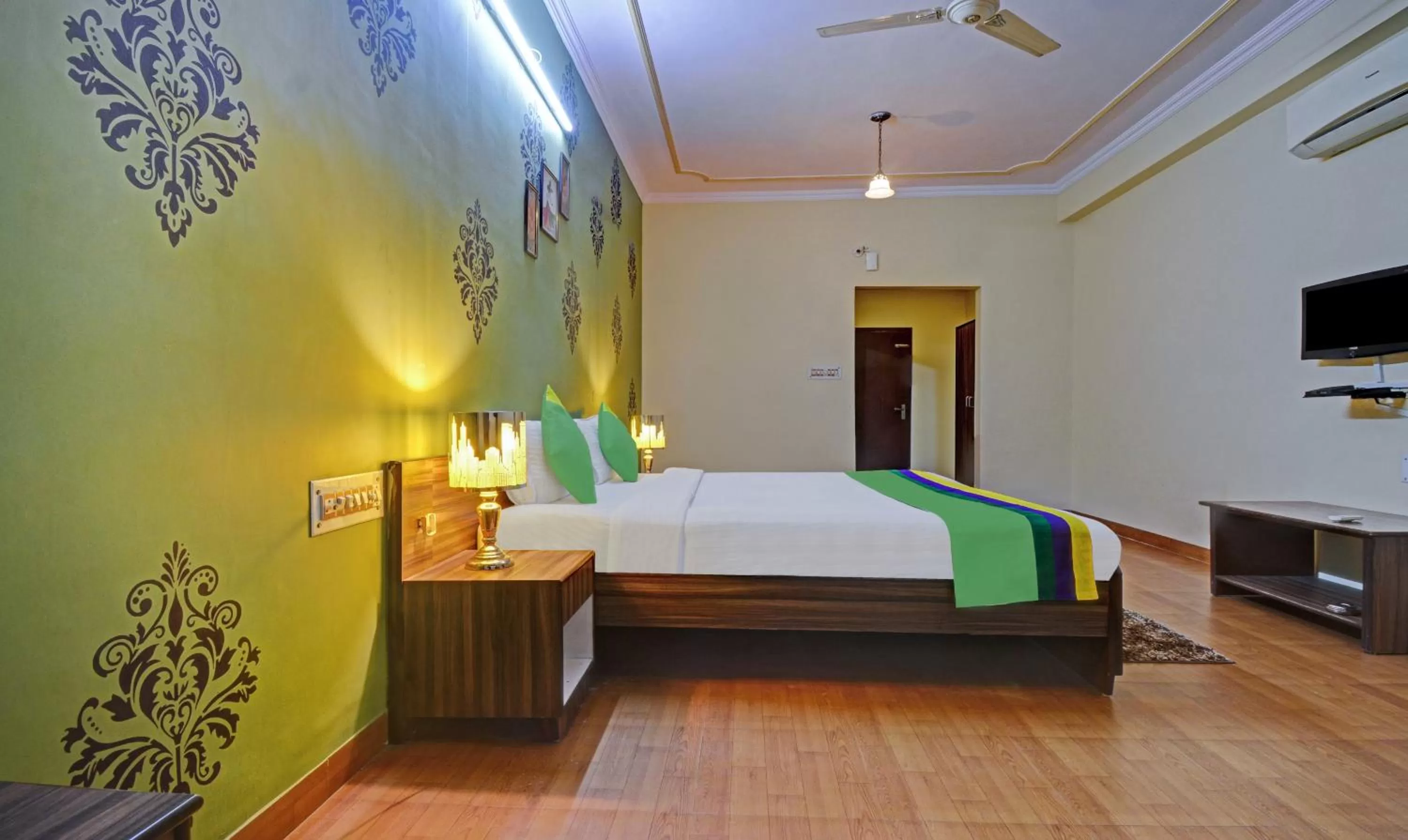 Bedroom, Bed in Treebo New Rockwell Vivek Vihar