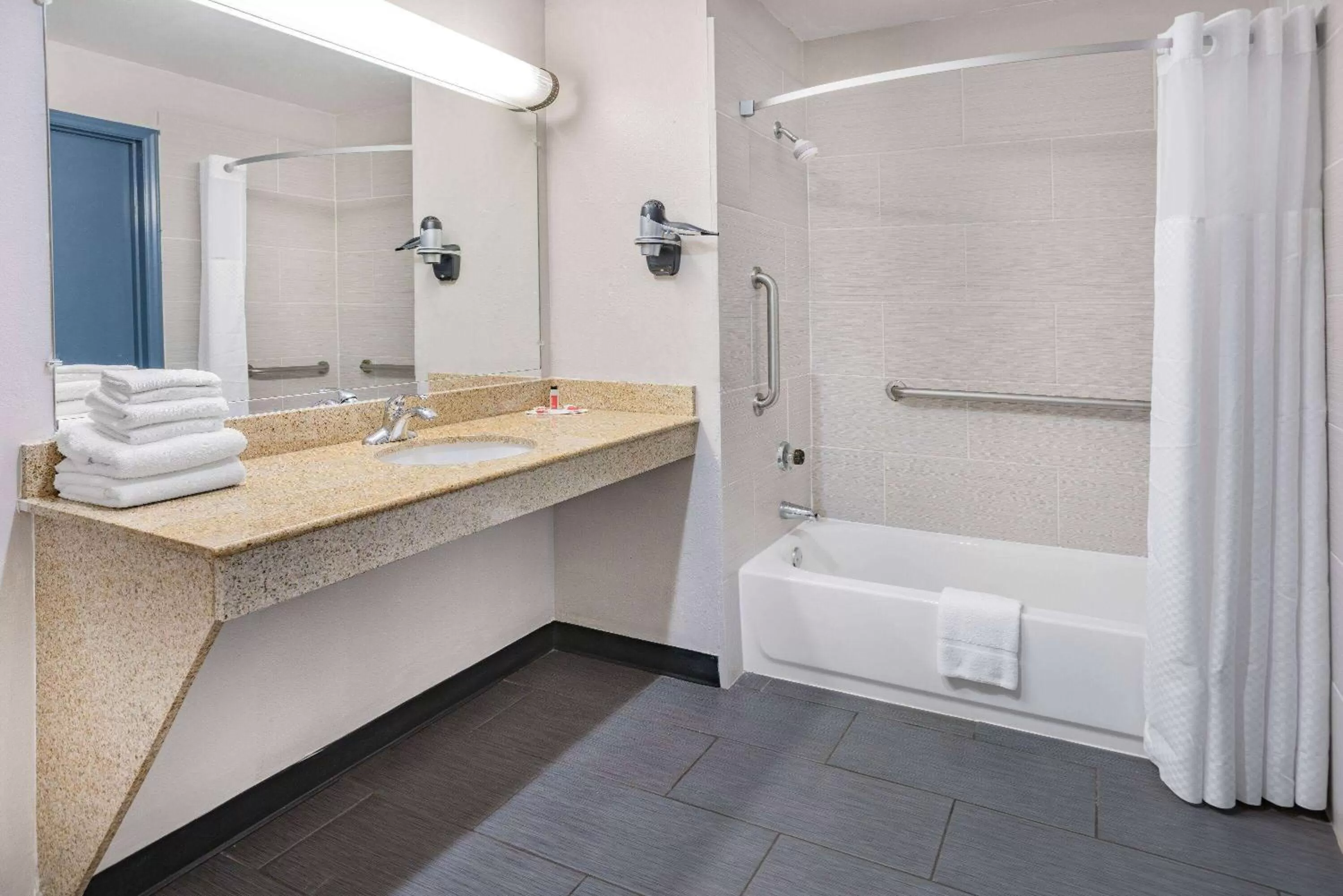 Bathroom in Days Inn by Wyndham Raleigh Glenwood-Crabtree