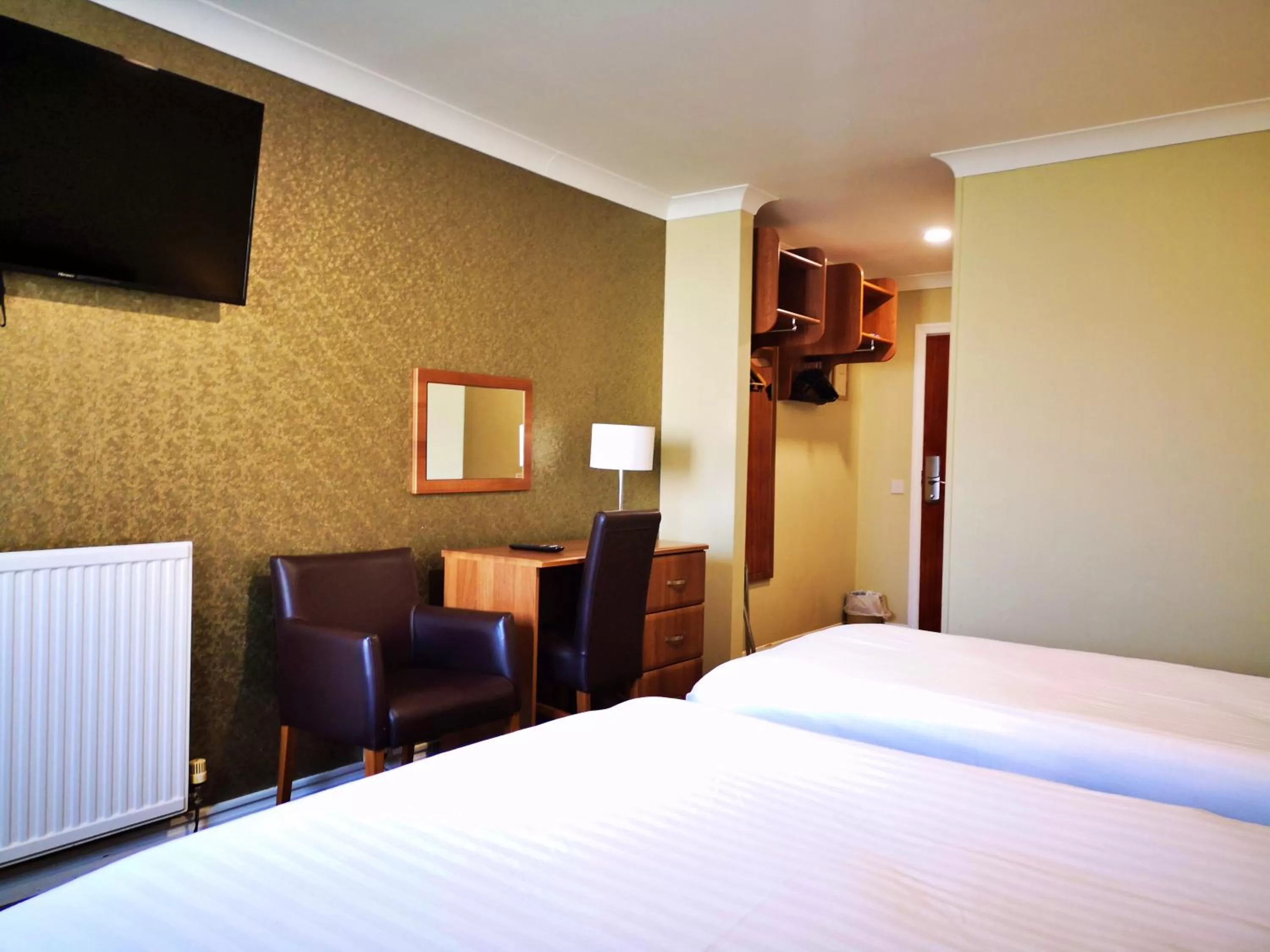 Bed in King Robert Hotel