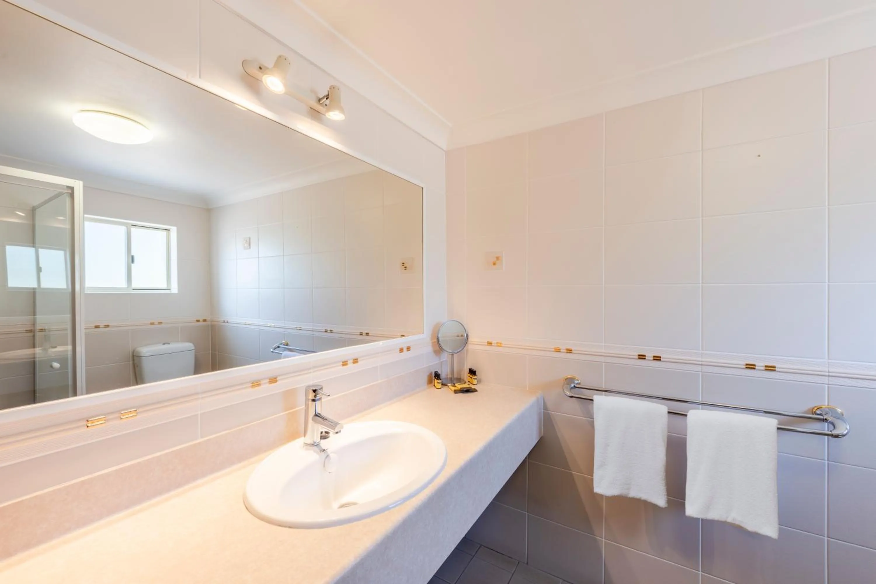 Bathroom in Best Western Plus Ambassador Orange