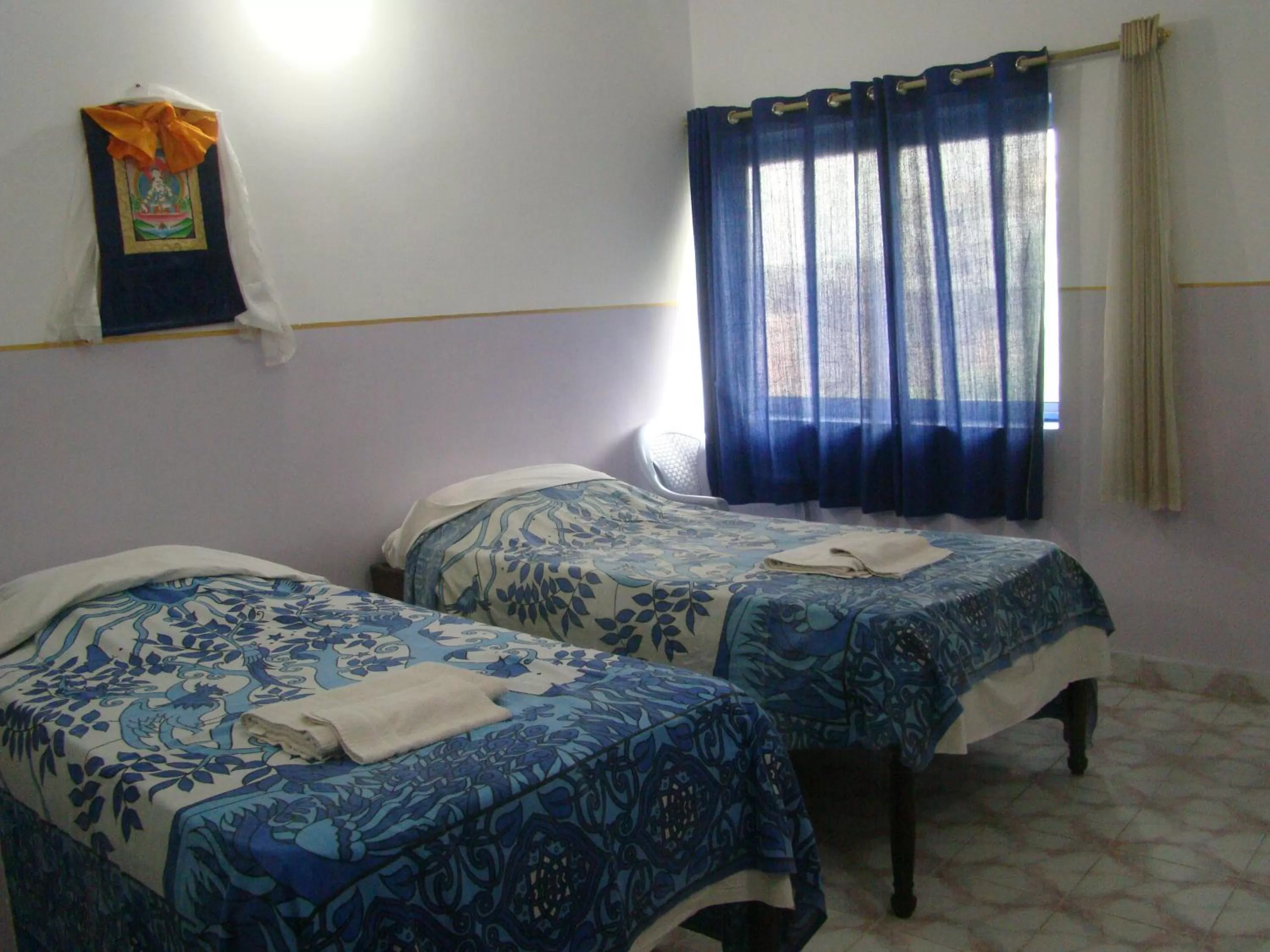 Bed in Tara Guest House