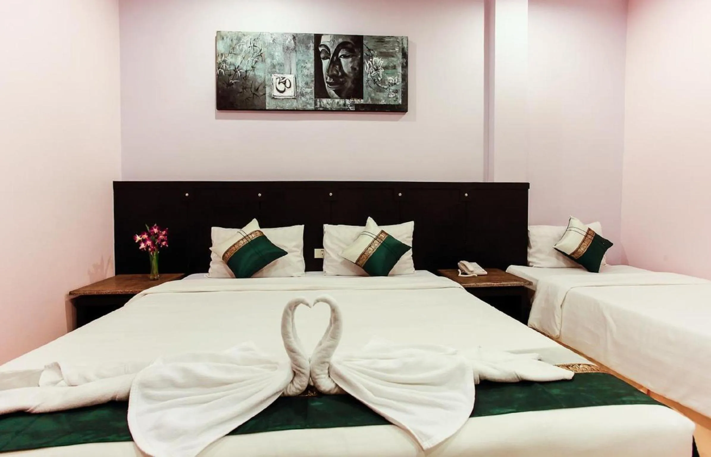 Bed in U Sabai Living Hotel