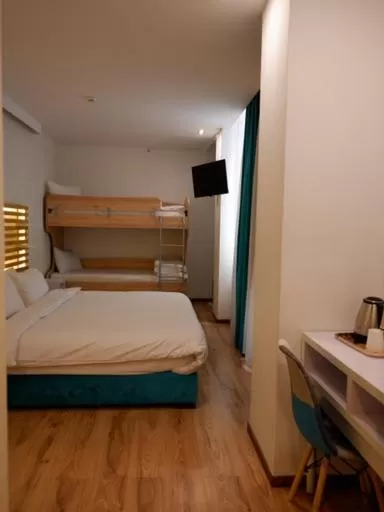 Bed in Athenian Montaza Hotel