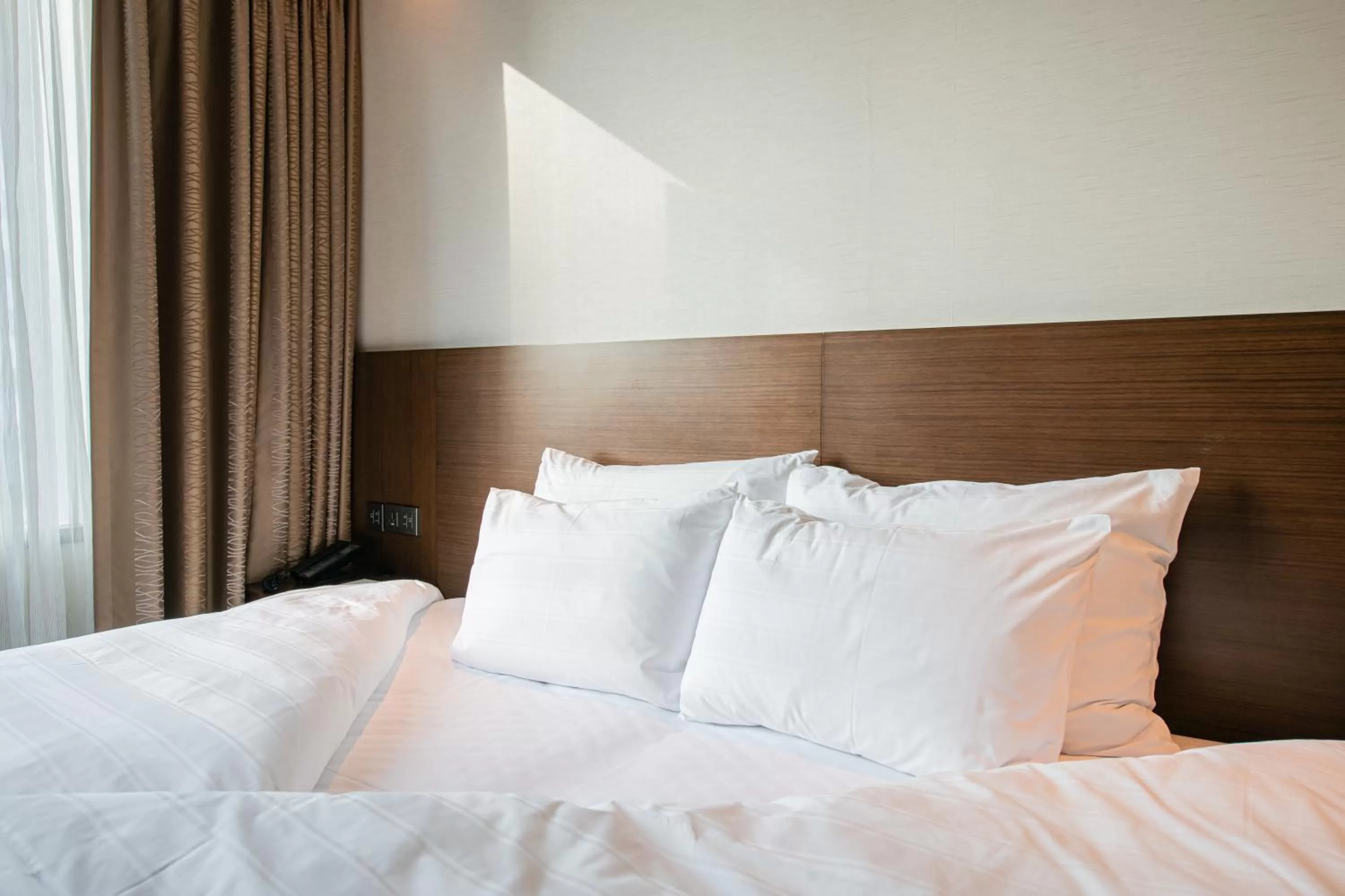 Bed in LOTTE CITY HOTEL Myeongdong