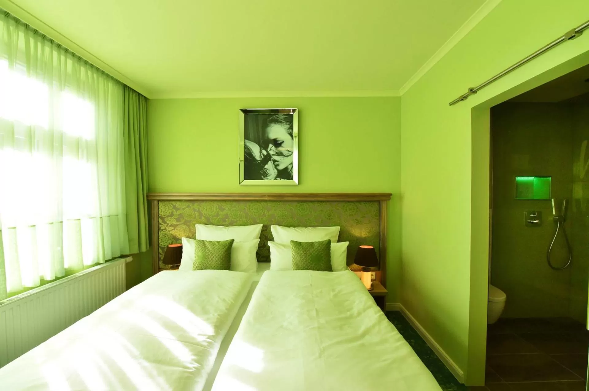 Photo of the whole room, Bed in MOMENTS Boutique Hotel