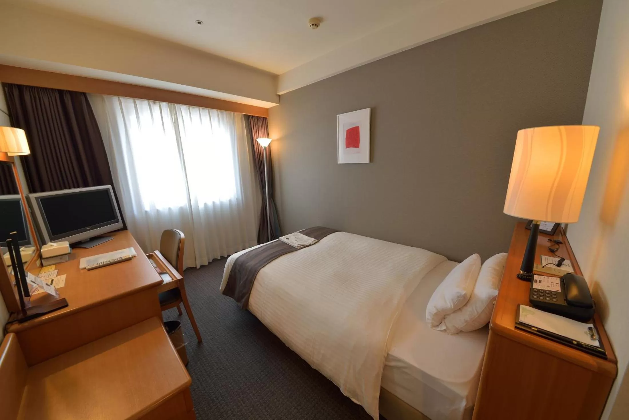 Photo of the whole room, Bed in Okayama Koraku Hotel