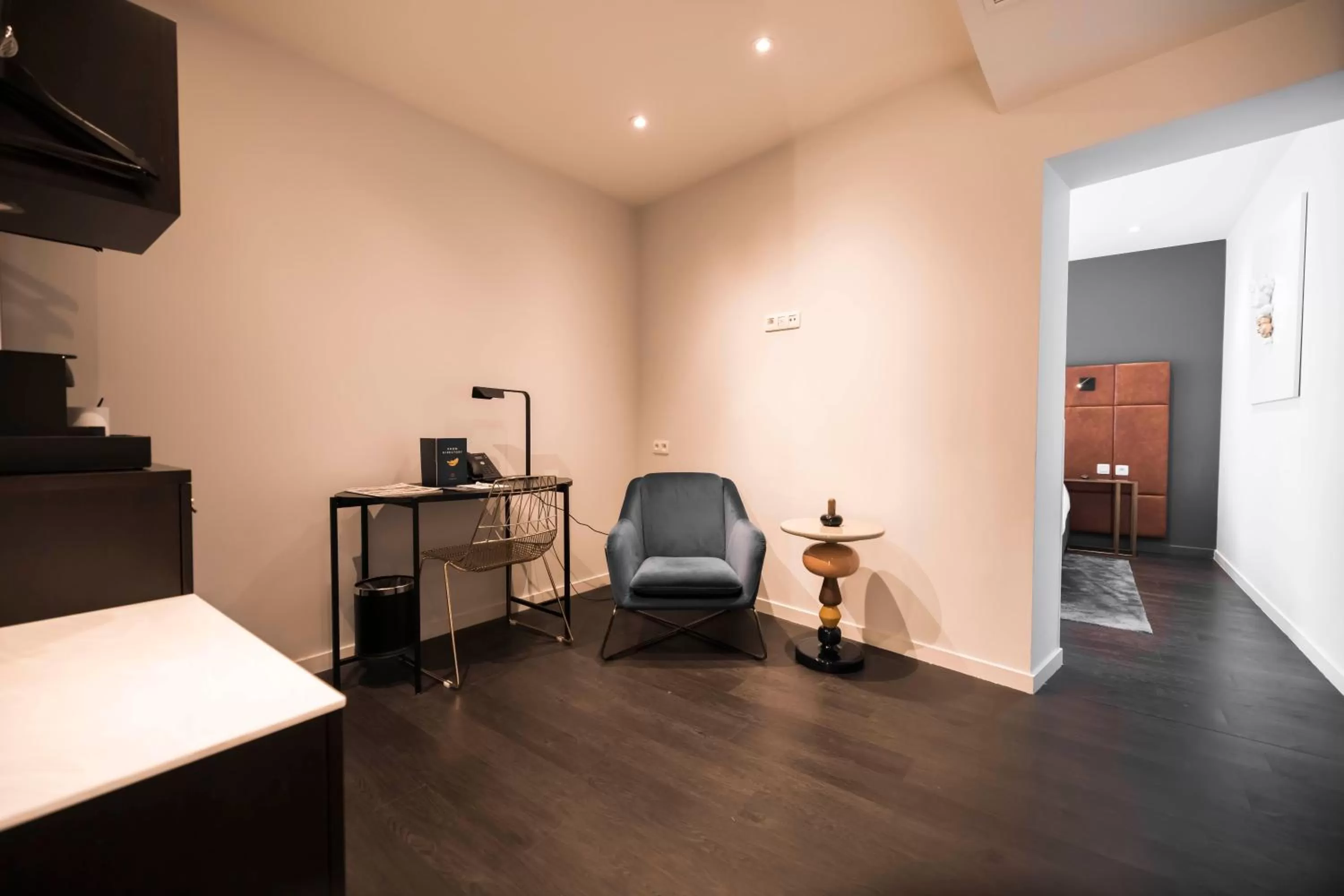 Seating area, Bed in Boutique Hotel Sablon by CW Hotel Collection