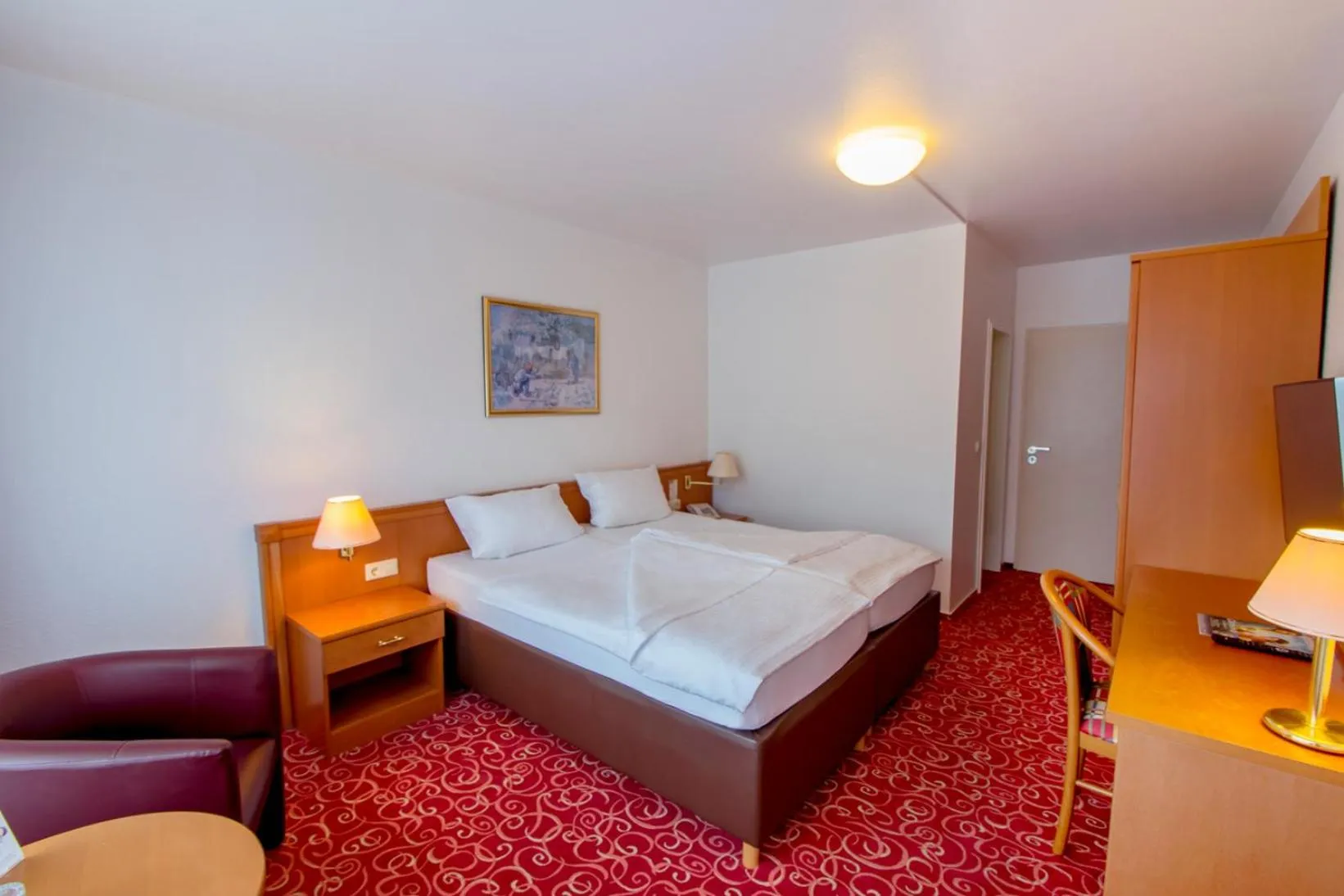 Bed in Caravelle Hotel im Park