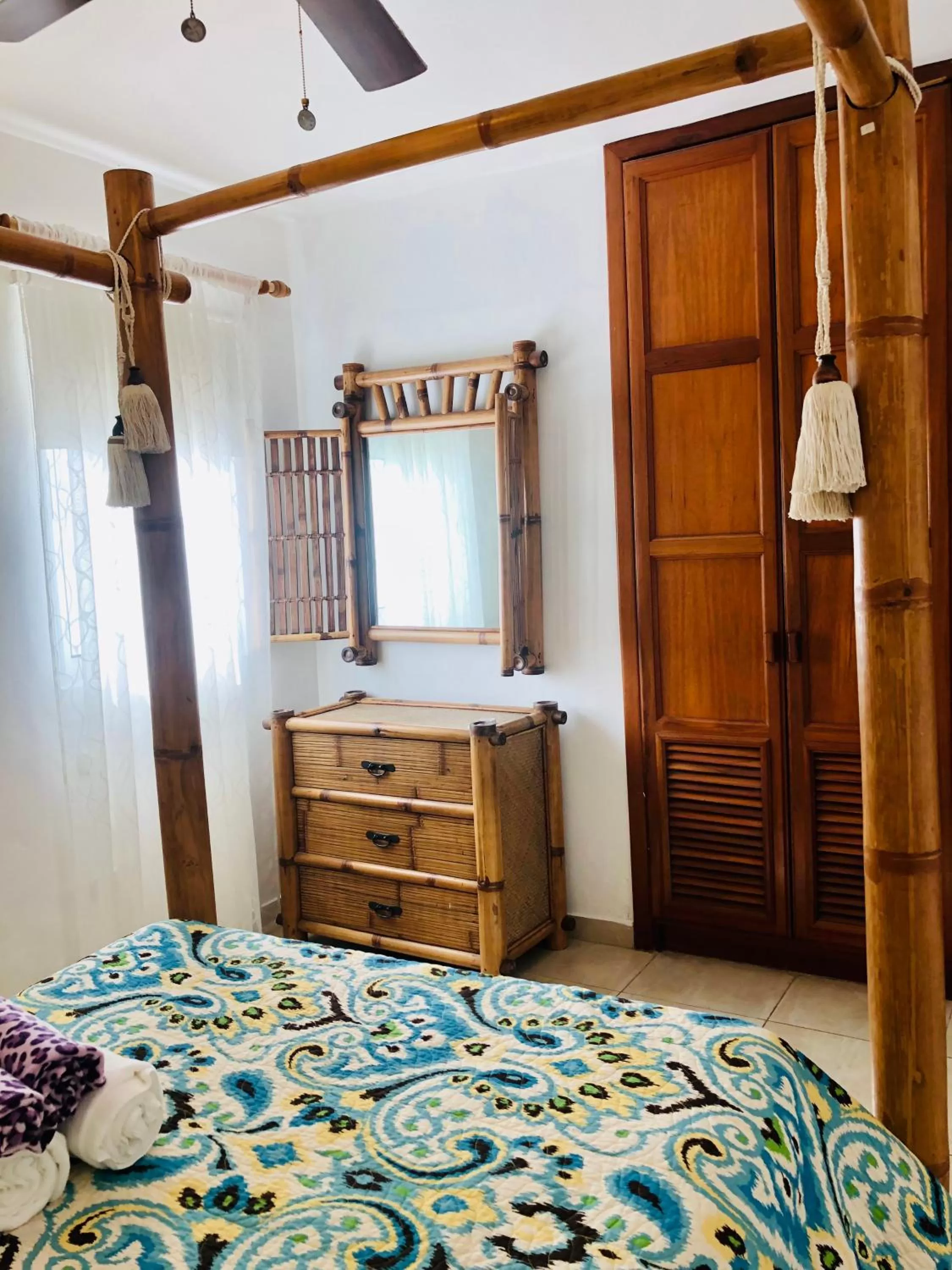 Bed in Los Corales Luxury Villas Beach Club and Spa