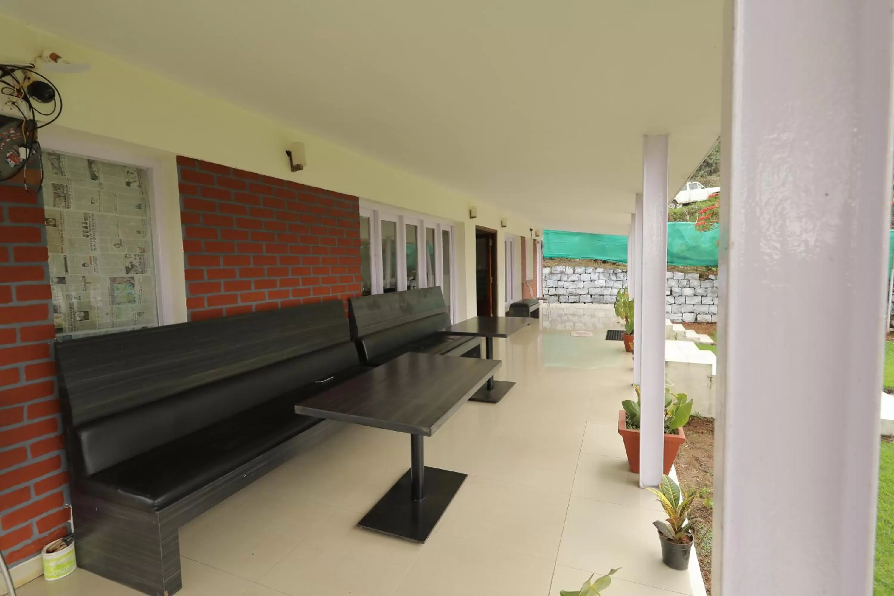 Property building, Balcony/Terrace in Nilgiris Inn By Lexstays Kotagiri, Ooty