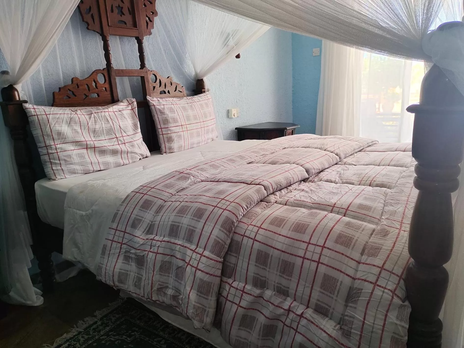 Bed in Serene Beach Resort