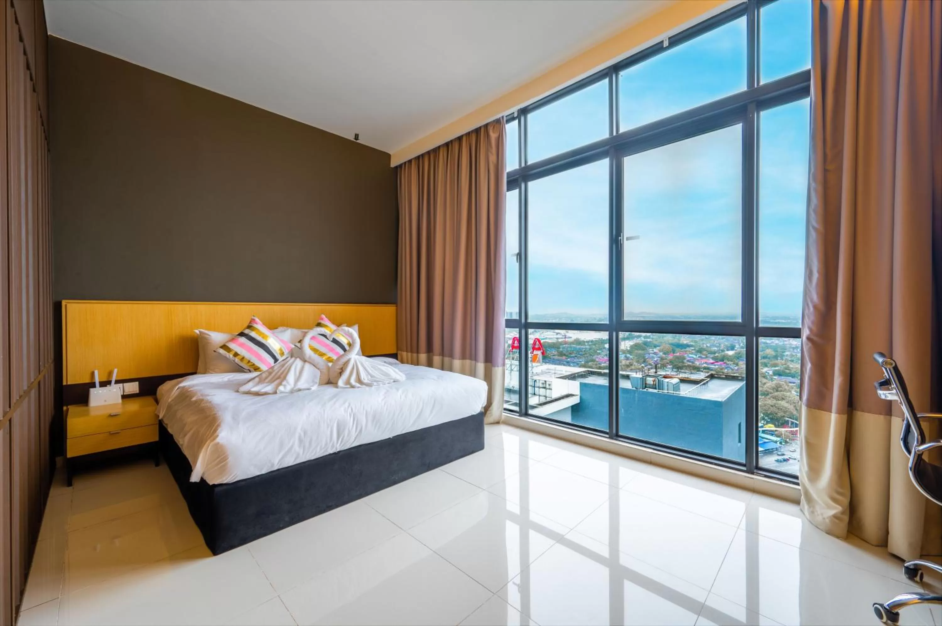 Bed in Greystone 99 Suites