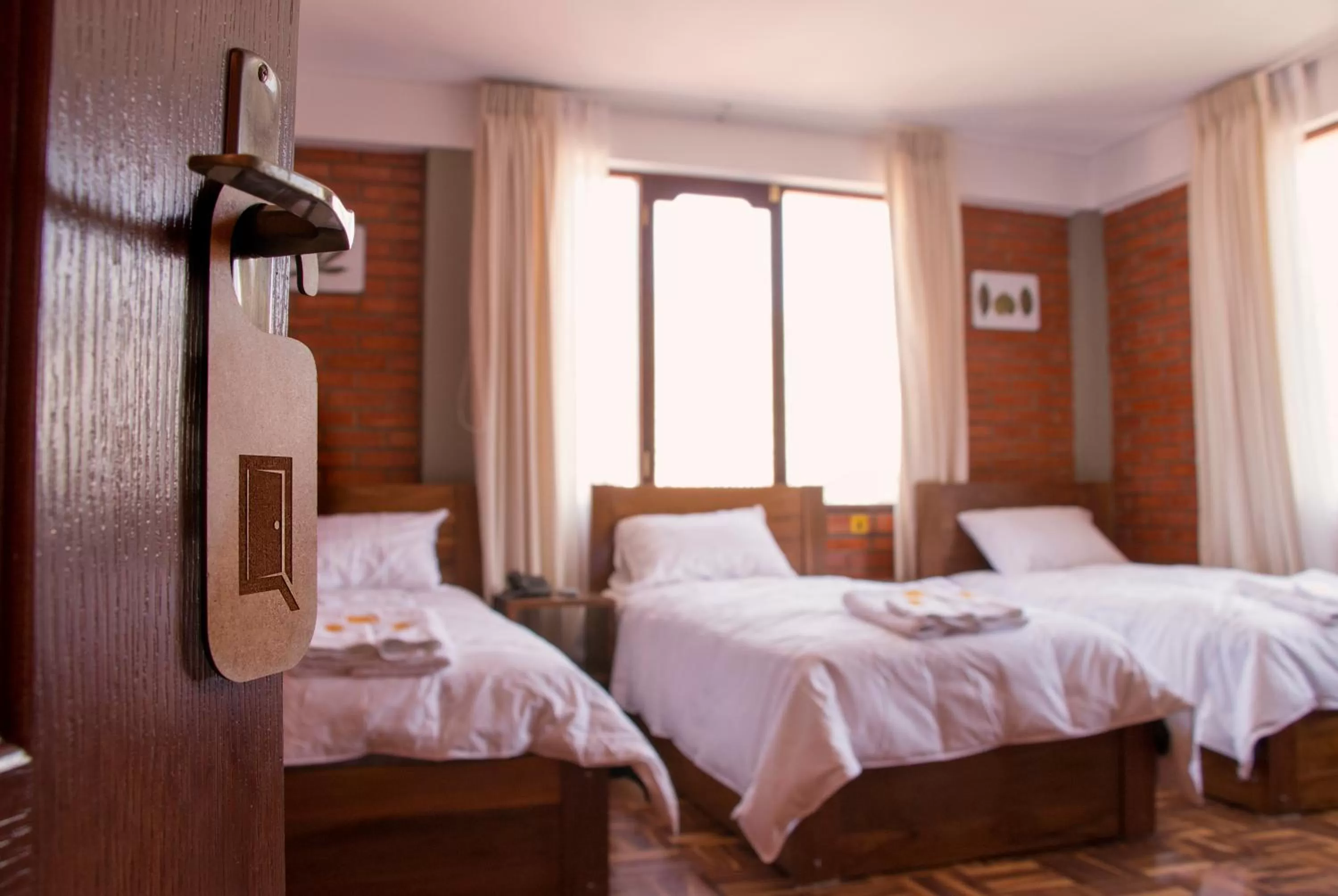 Photo of the whole room in Qhini Hotel Boutique