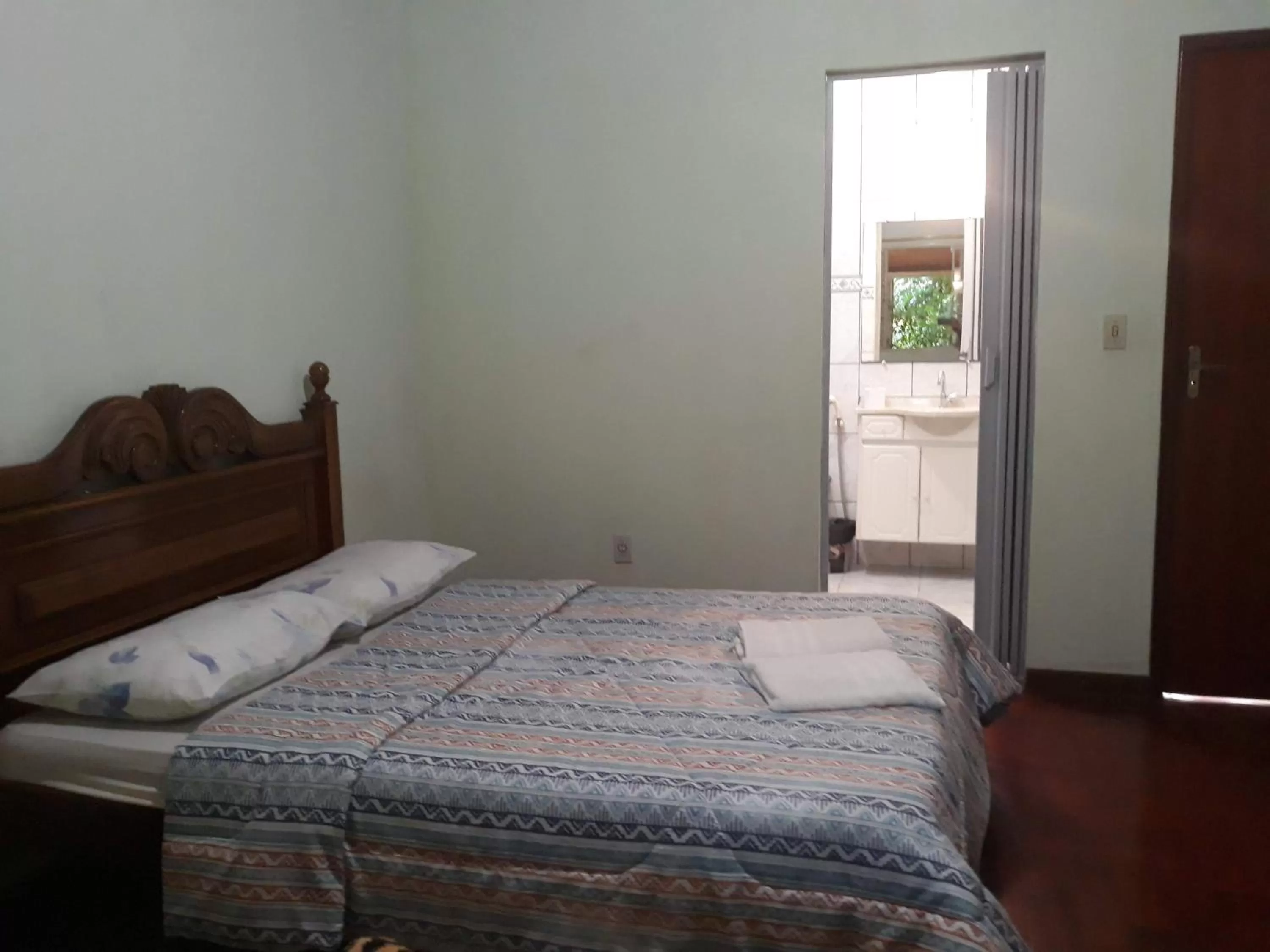 Bed in Pousada do Ribeirão