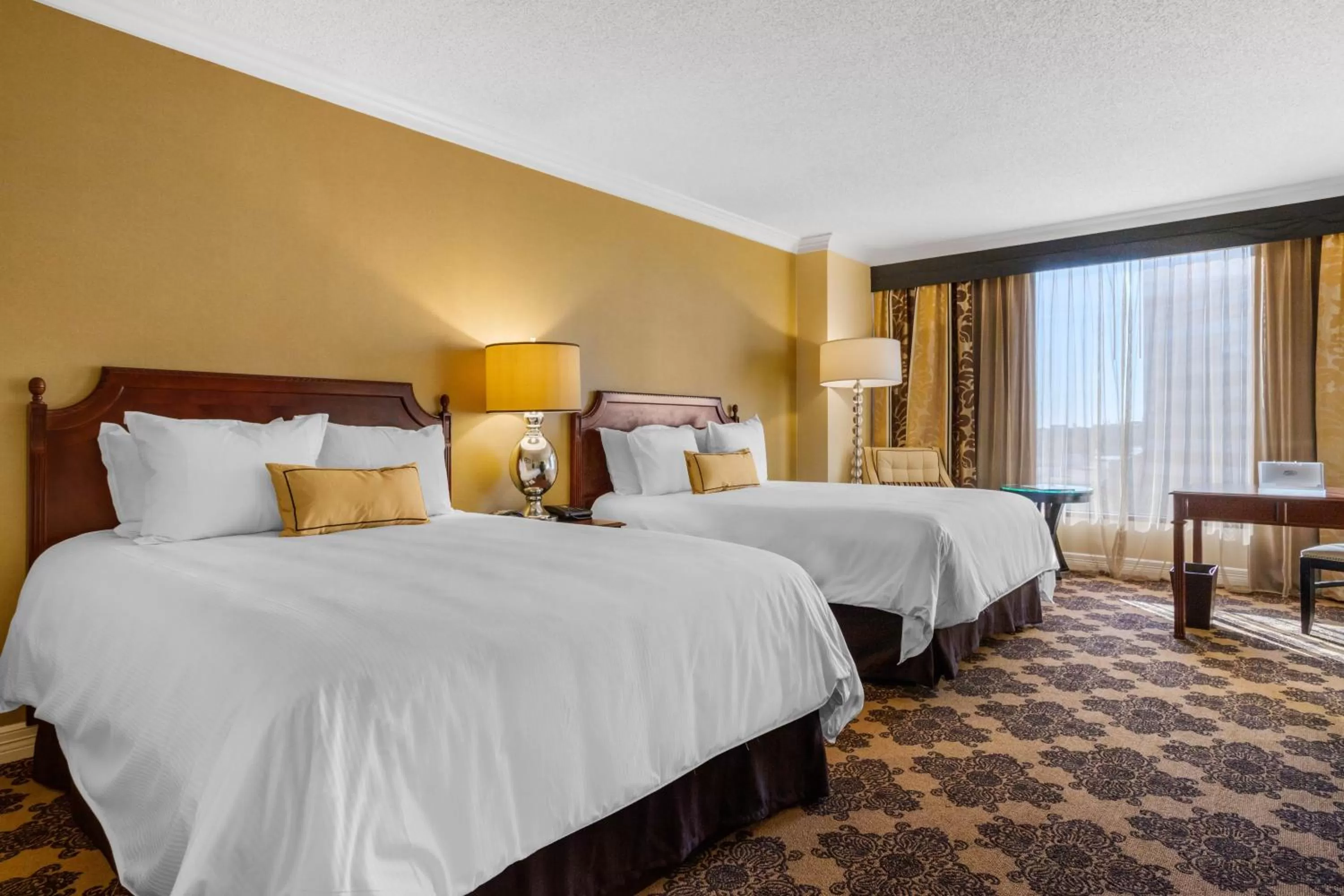 Bed in Omni Houston Hotel