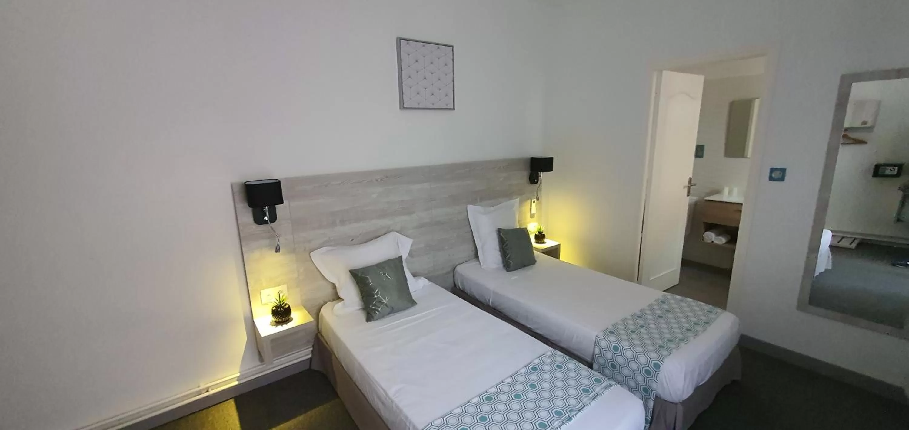 Photo of the whole room, Bed in Hôtel L'Alsace