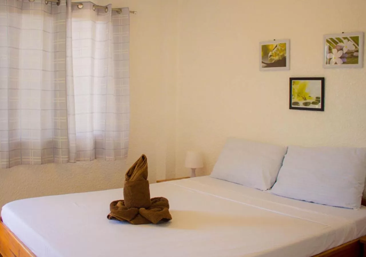 Bed in Jugalis Hotel and Restaurant