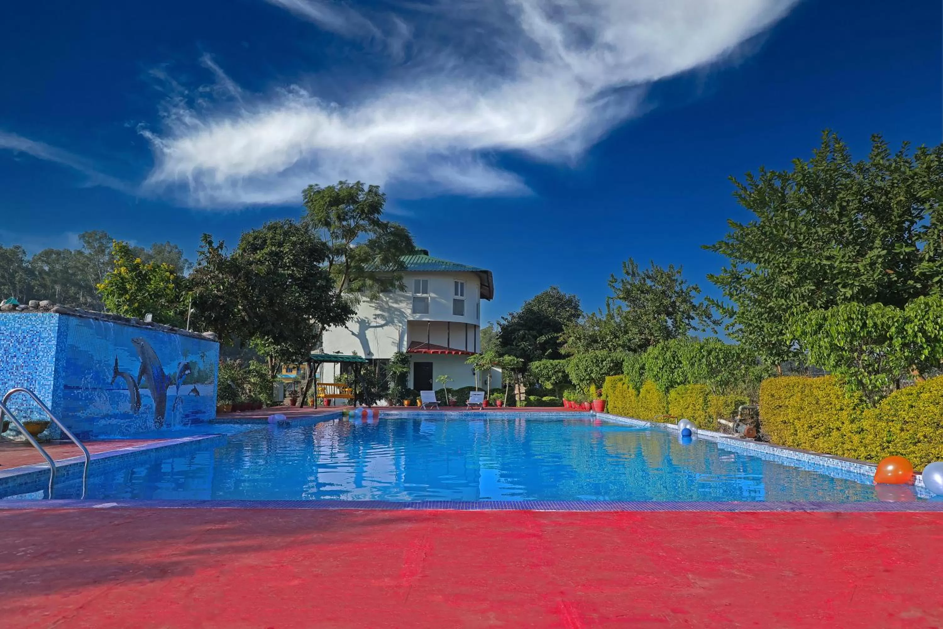 Swimming pool in Corbett Treat Resort By Atya Hotels