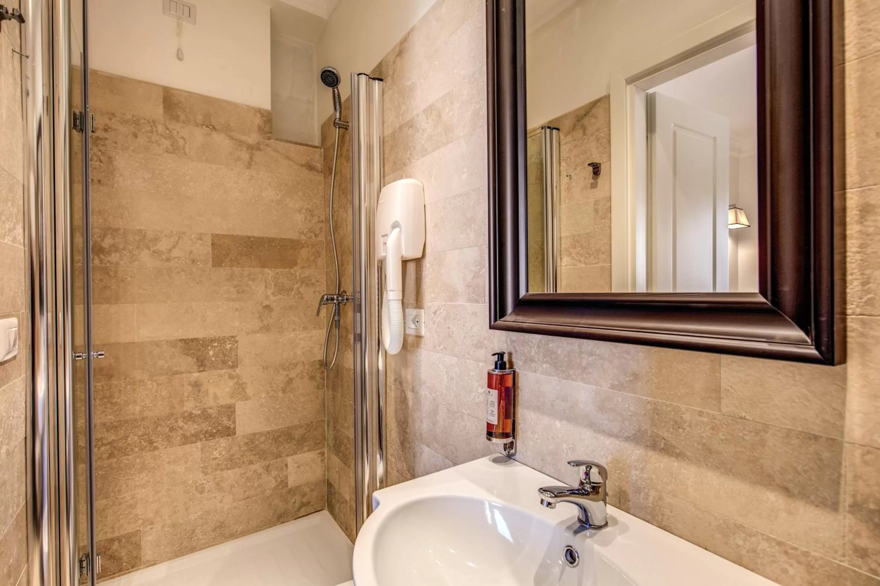 Bathroom in Hotel Domus Mea