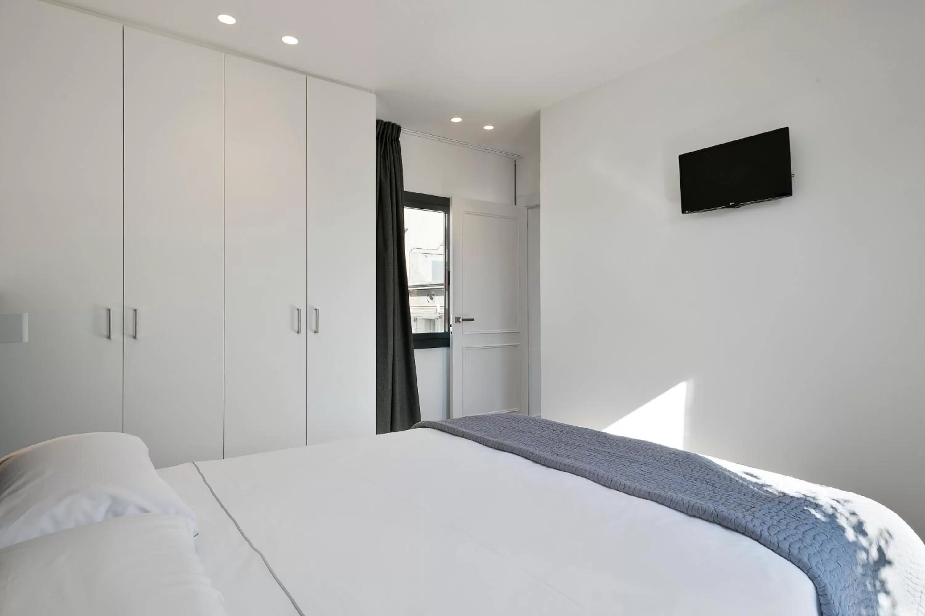 TV and multimedia, Bed in Murmuri Residence Mercader