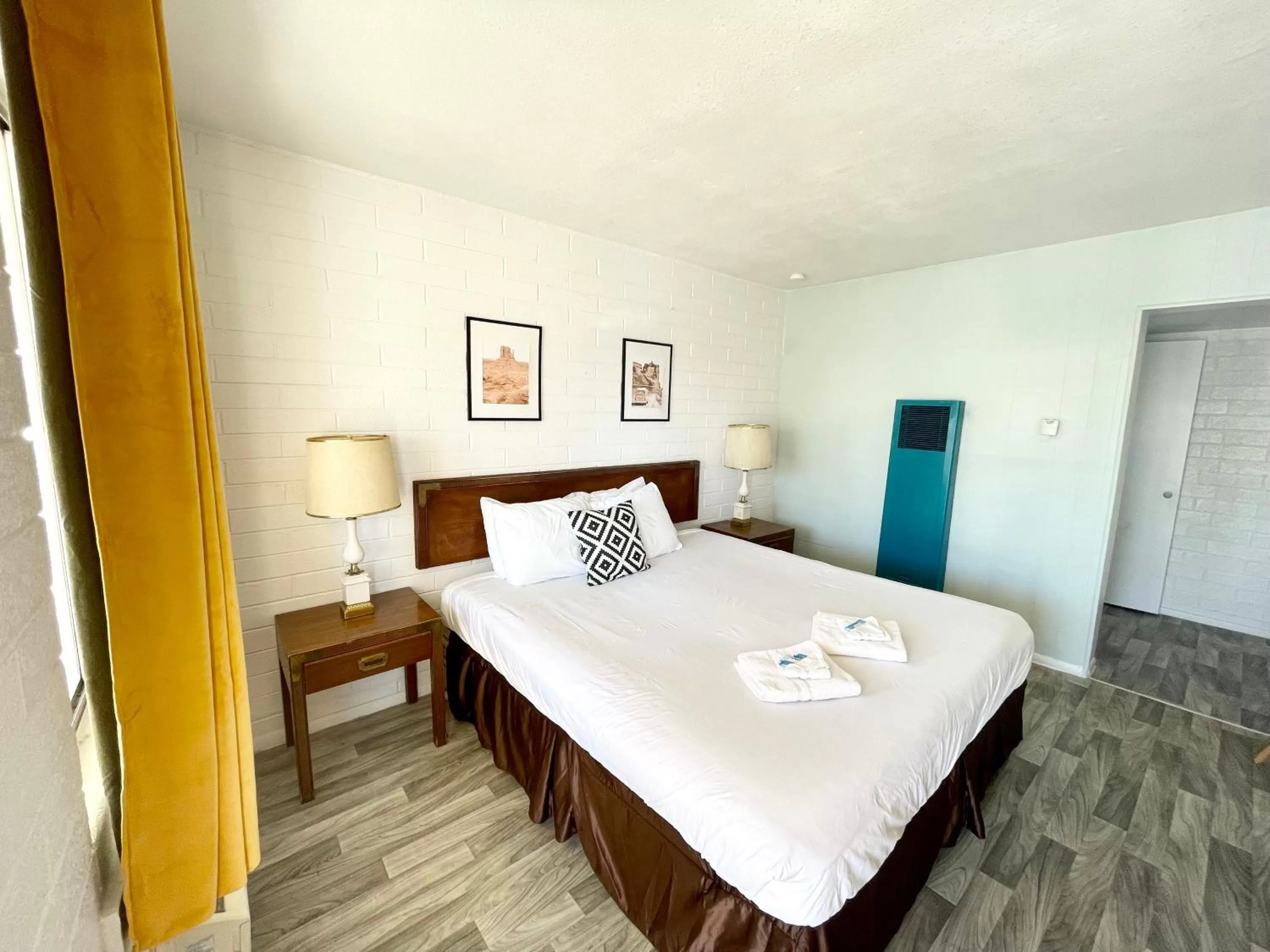 Bed in The Postcard Motel