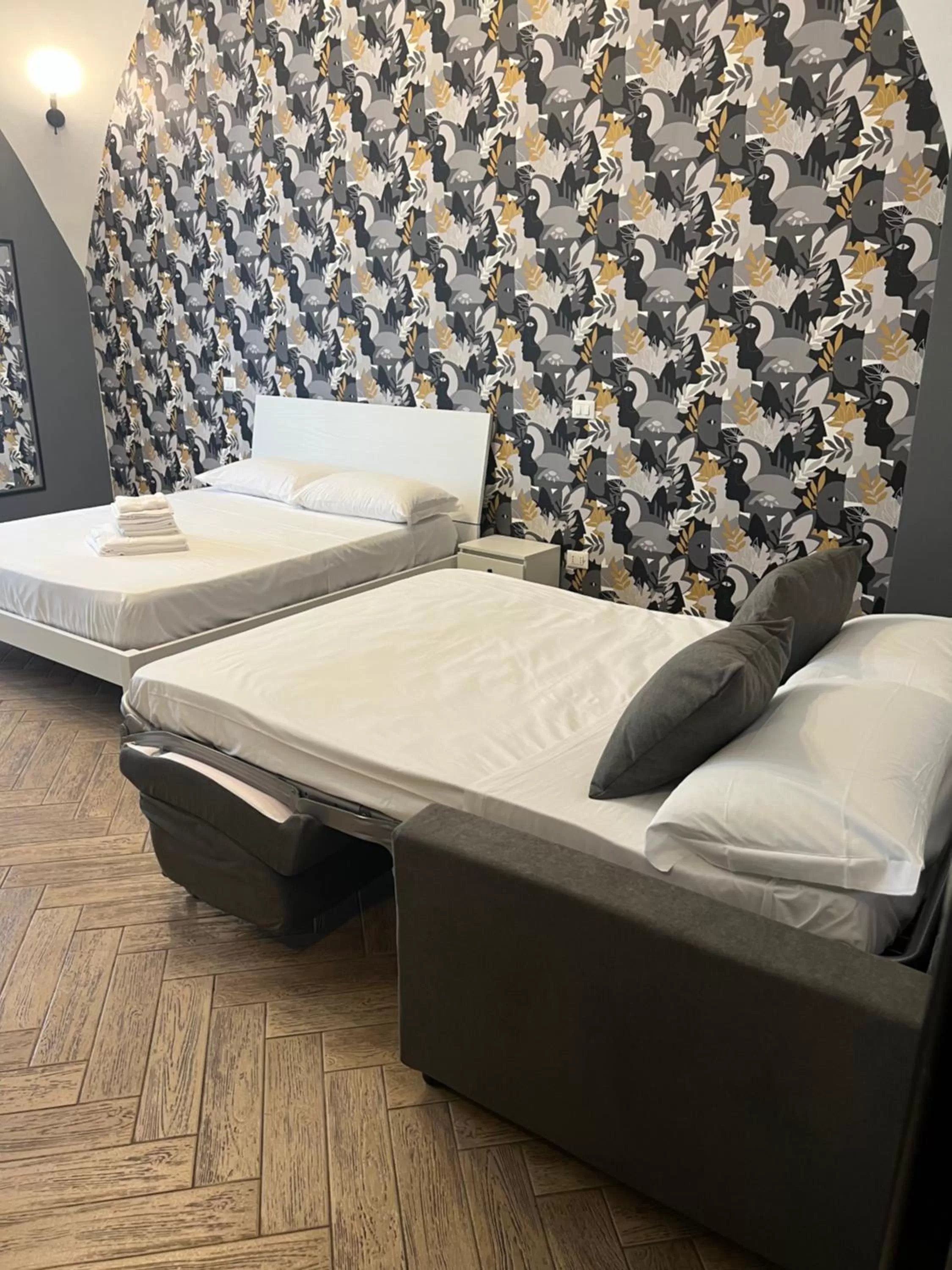 Bed in Palazzo Cardinale Rooms