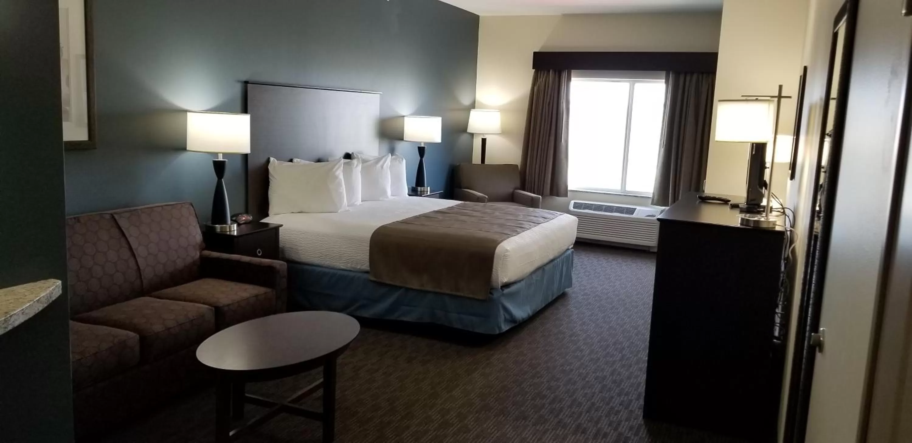 Photo of the whole room, Bed in AmericInn by Wyndham Sioux Falls North