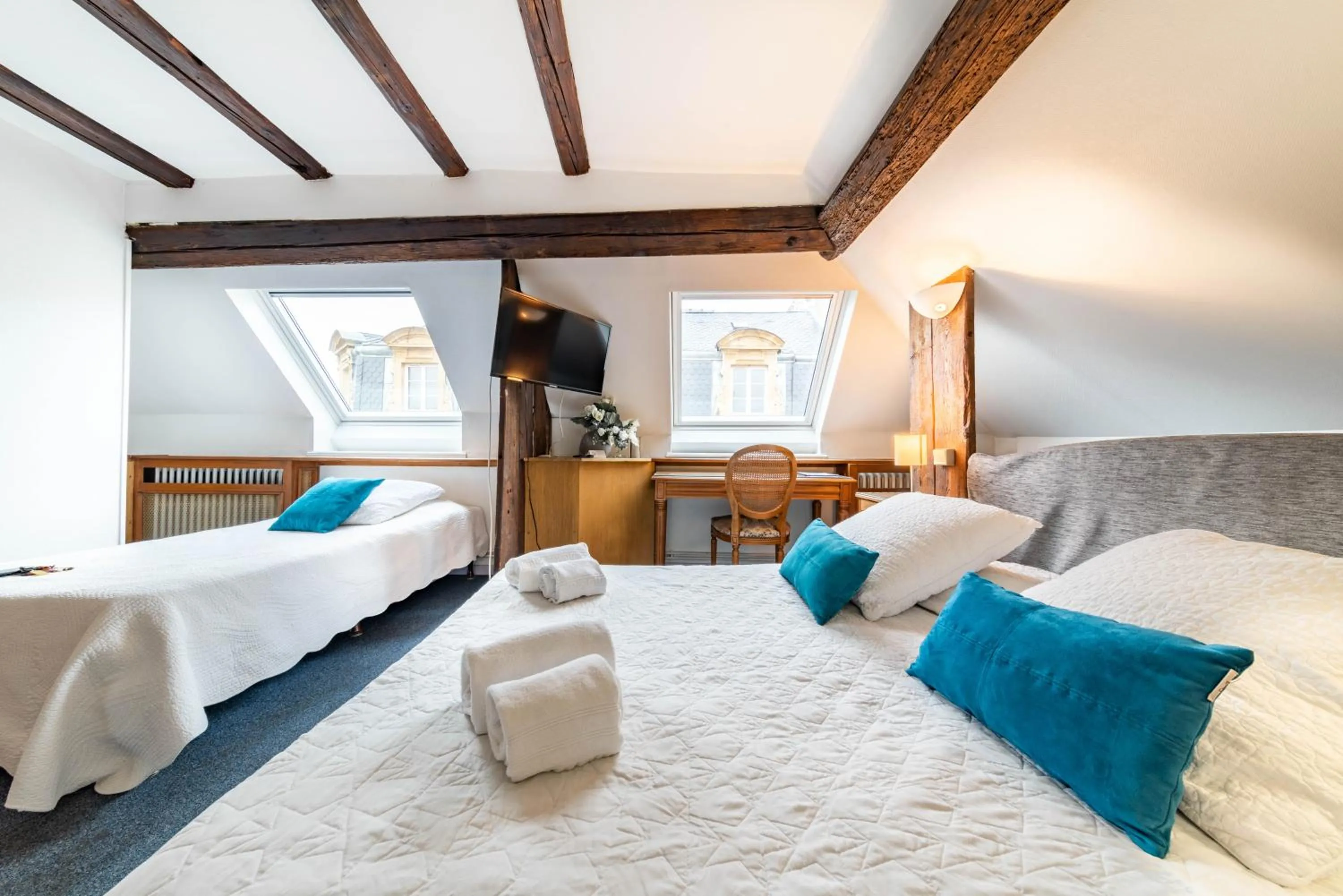 Bedroom in Hôtel du Centre