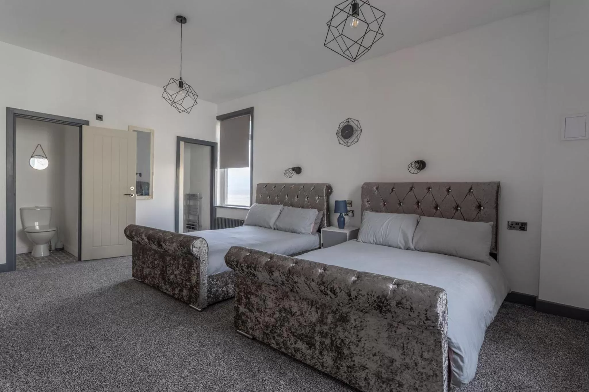 Bed in RESIDENCY LUXURY SEAFRONT HOTEL