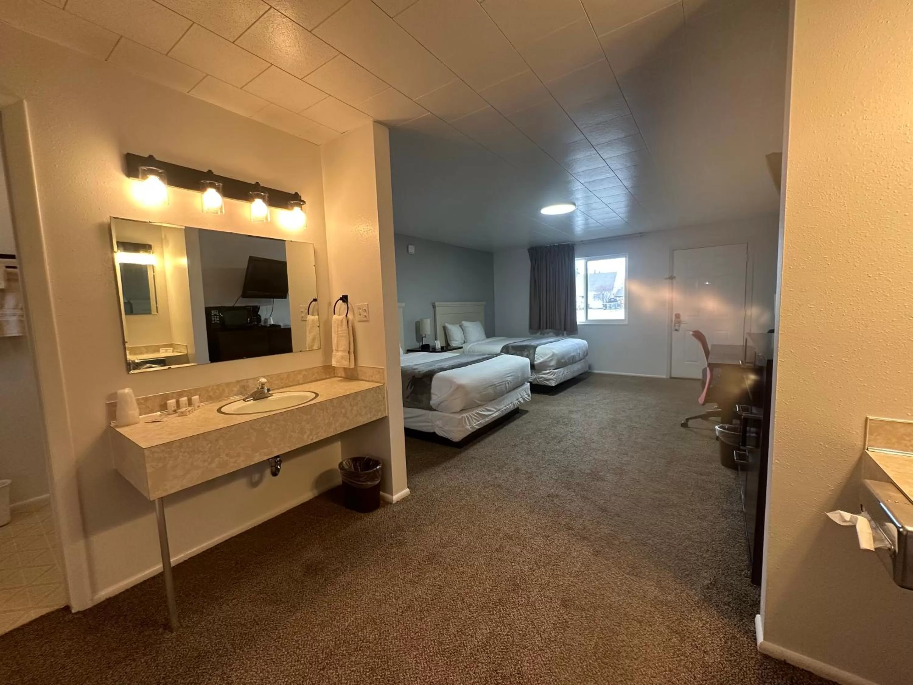 Bed in Fossil Butte Motel