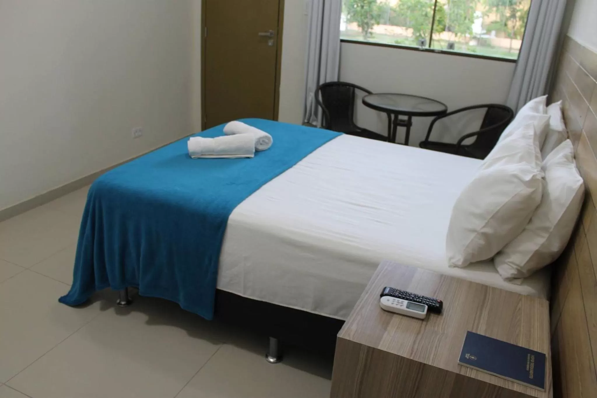 Bed in Pousada Das Palmeiras