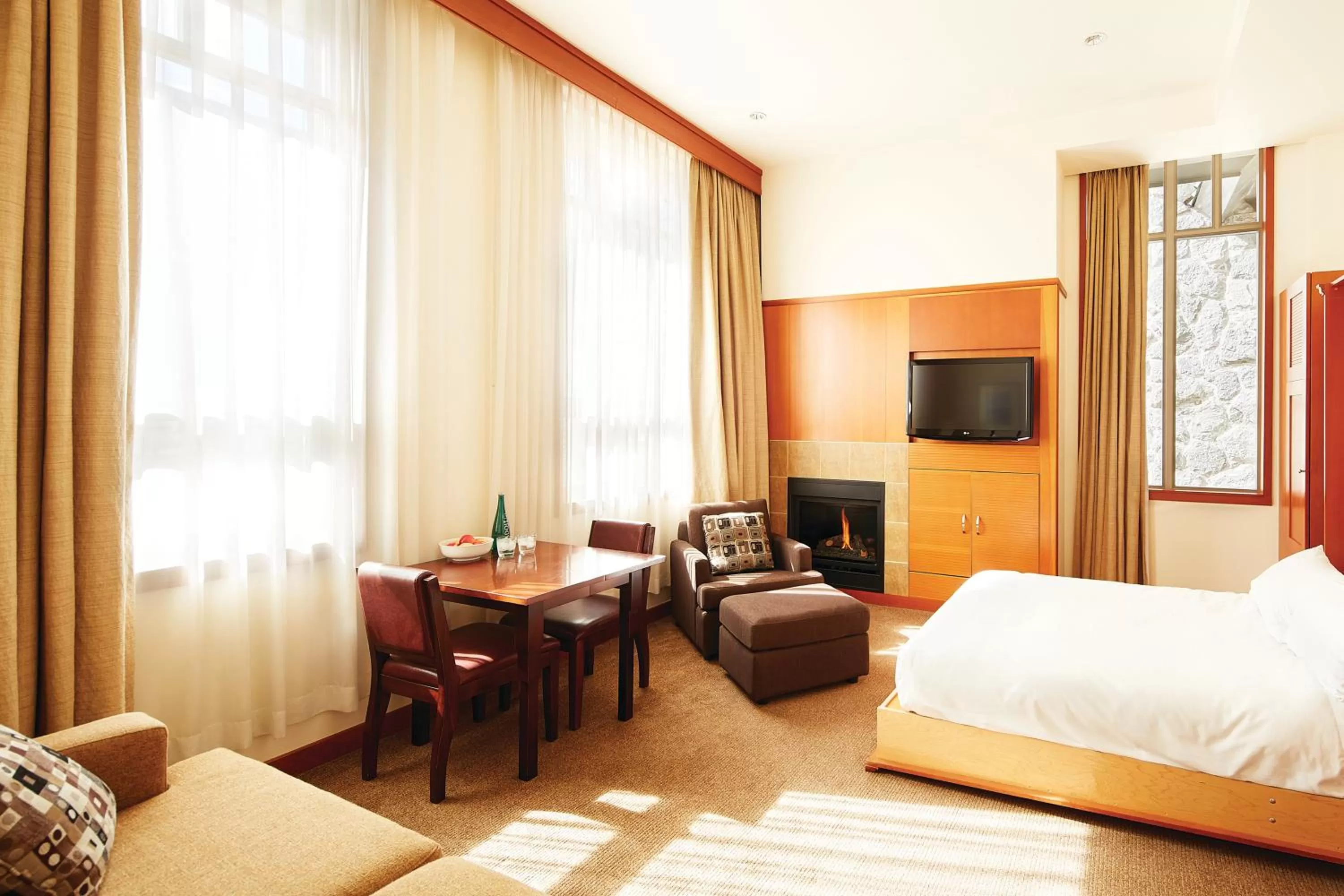 Photo of the whole room, Bed in Pan Pacific Whistler Village Centre