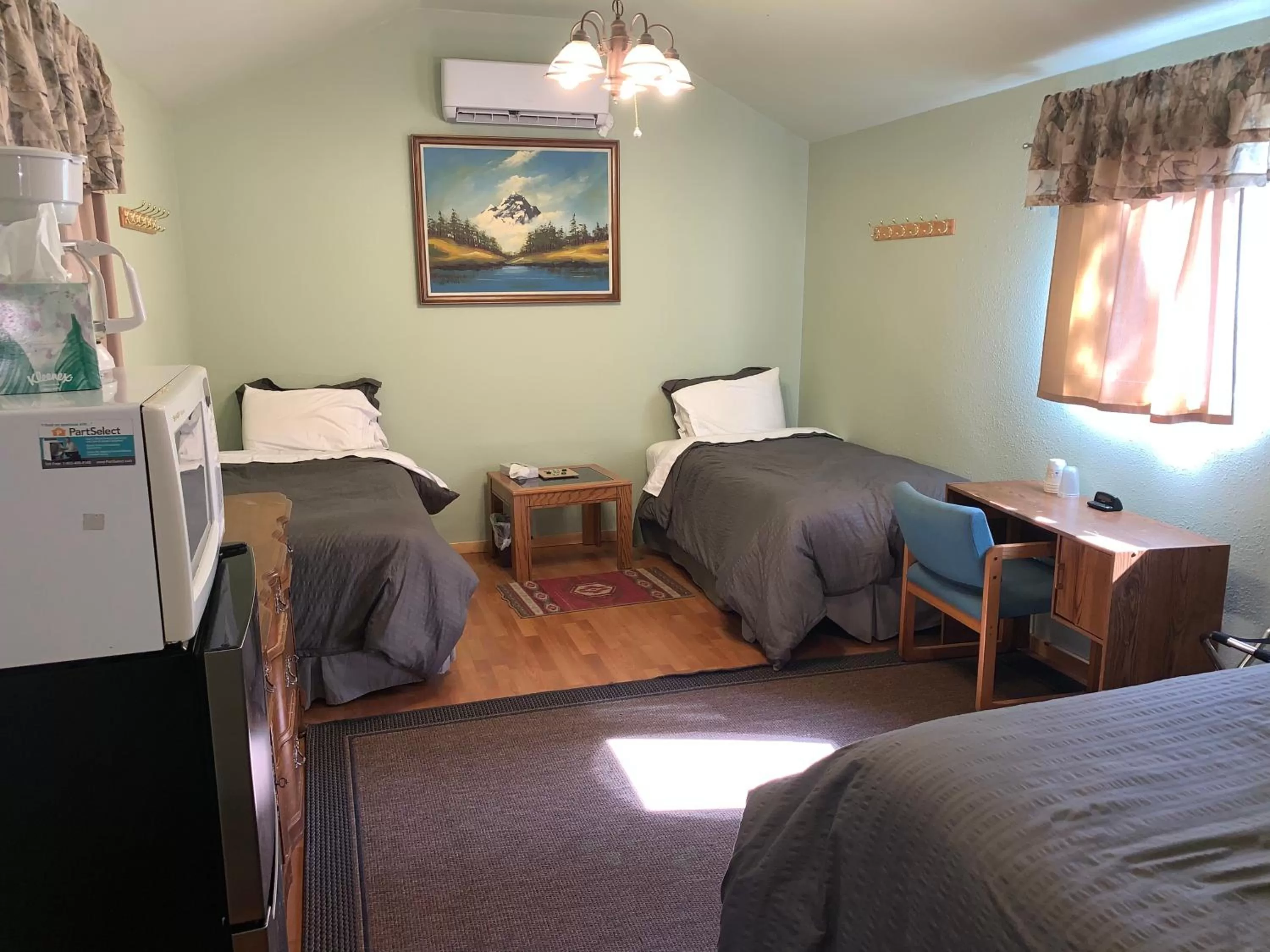 Bed in Glacier Haven Inn