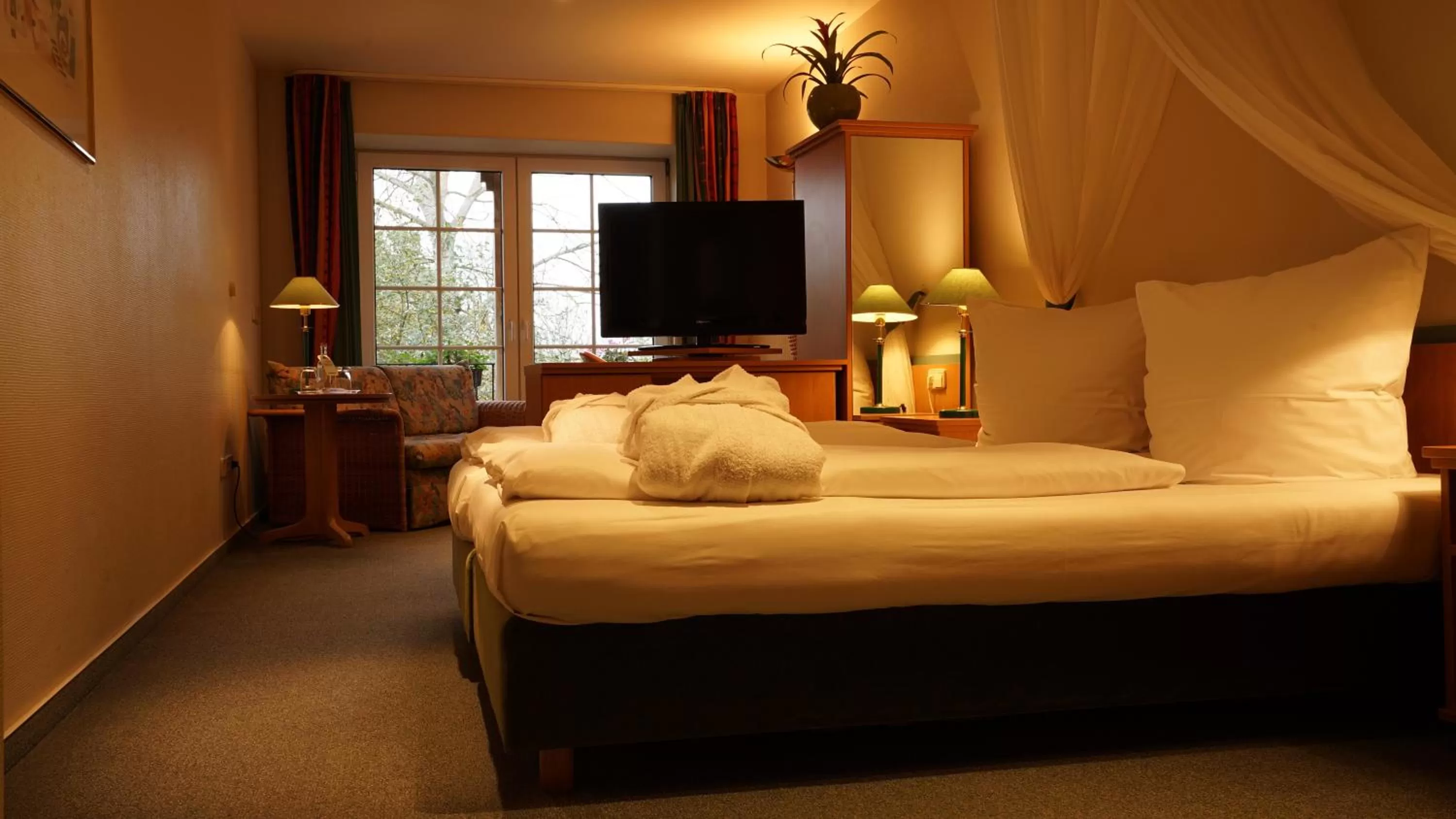 Photo of the whole room, Bed in Brackstedter Mühle e.K.