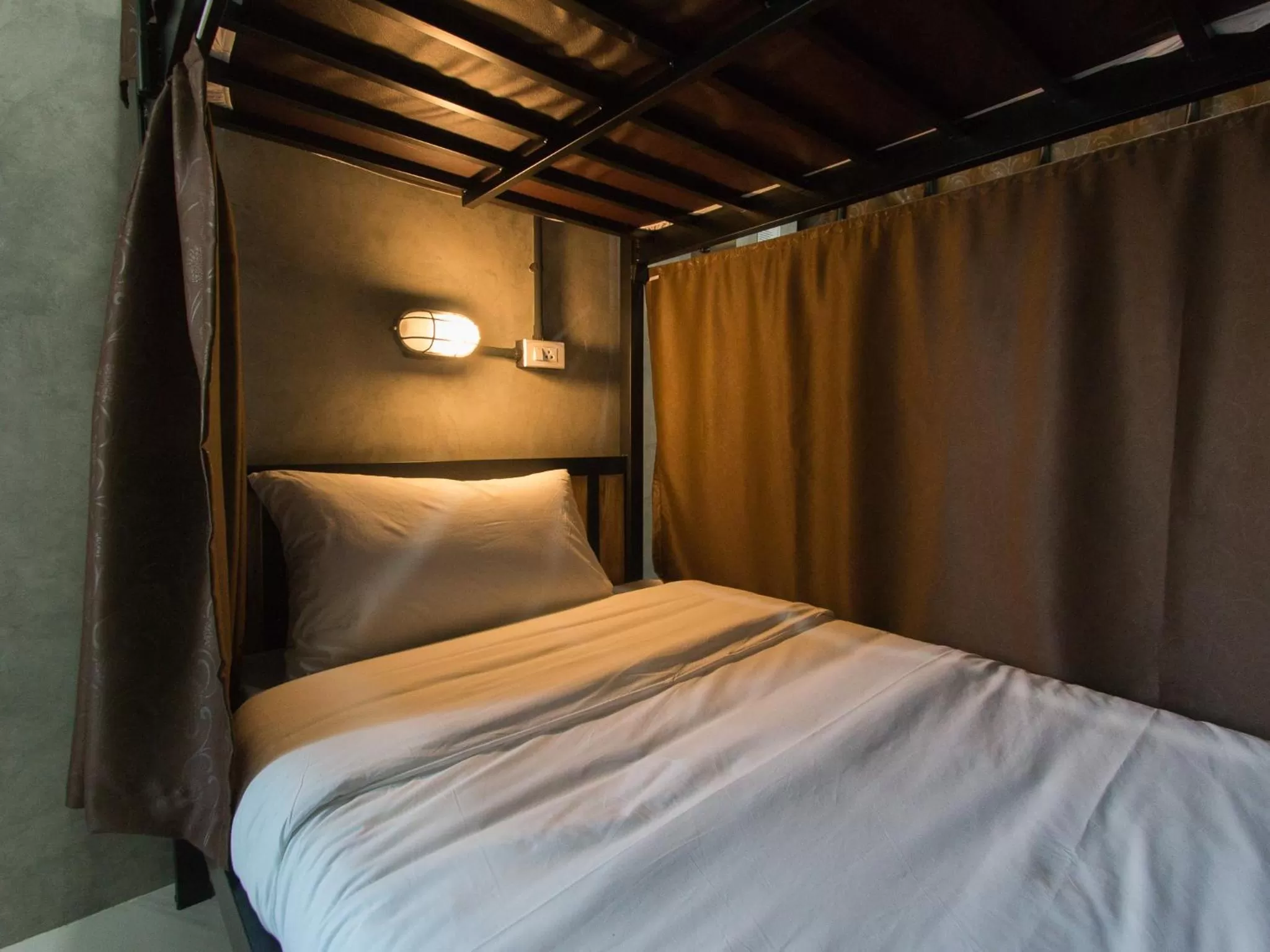 Bed in Puak Taem Boutique Hotel
