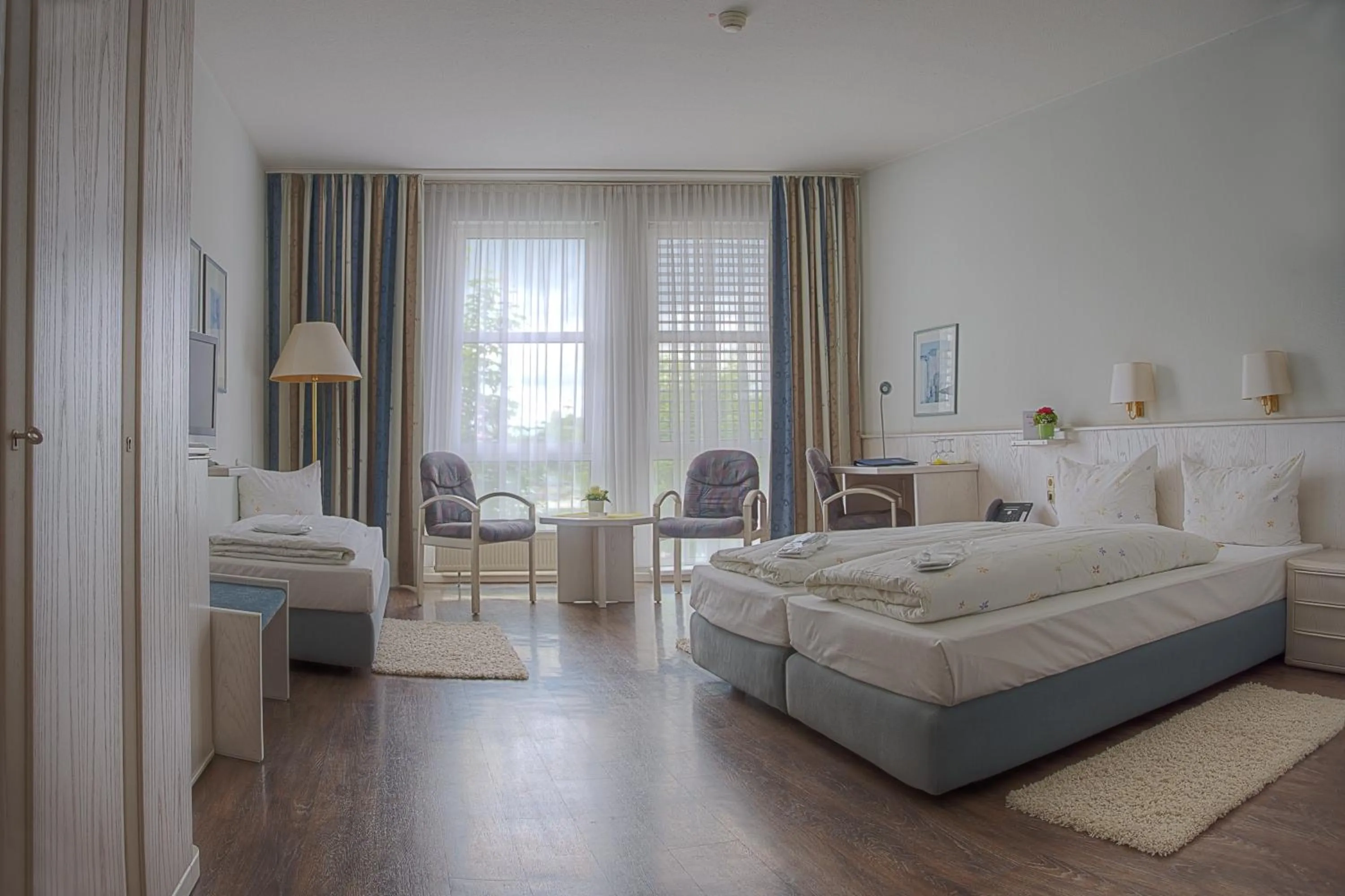 Photo of the whole room, Bed in Euro Park Hotel Hennef