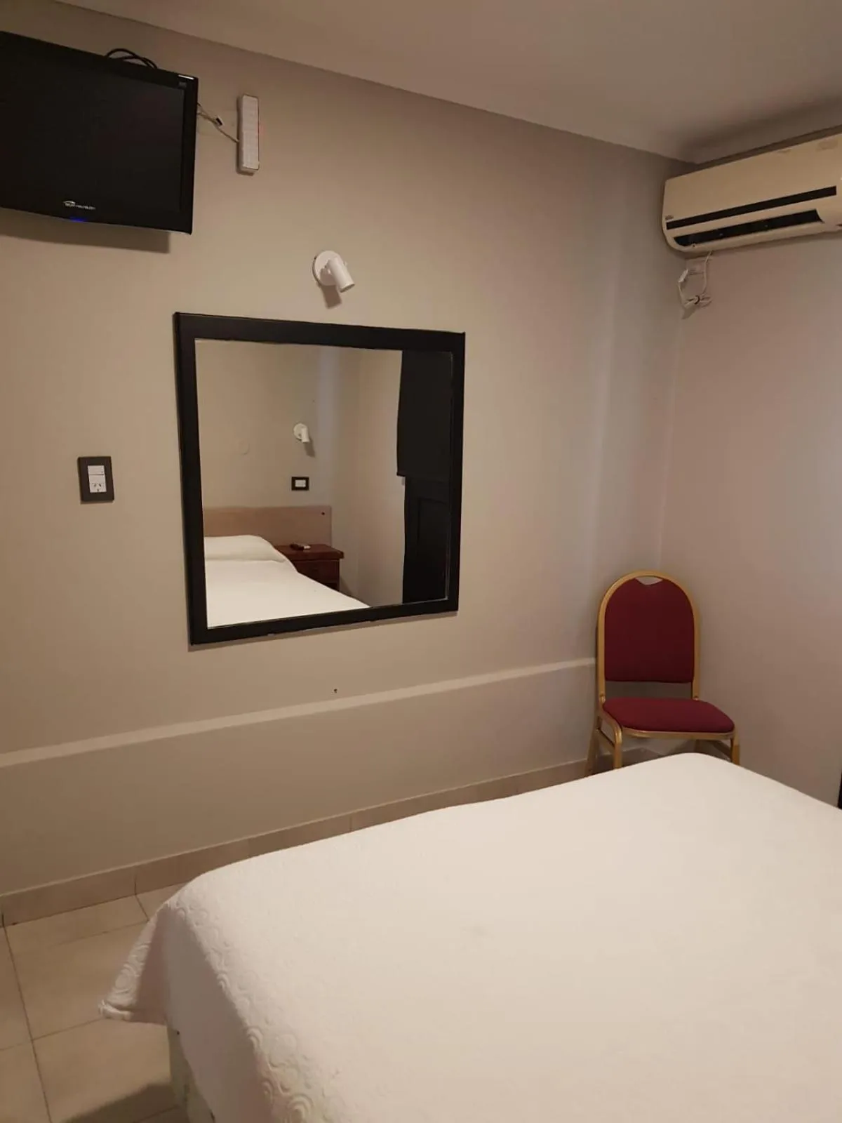 Bed in Hotel Marilian II