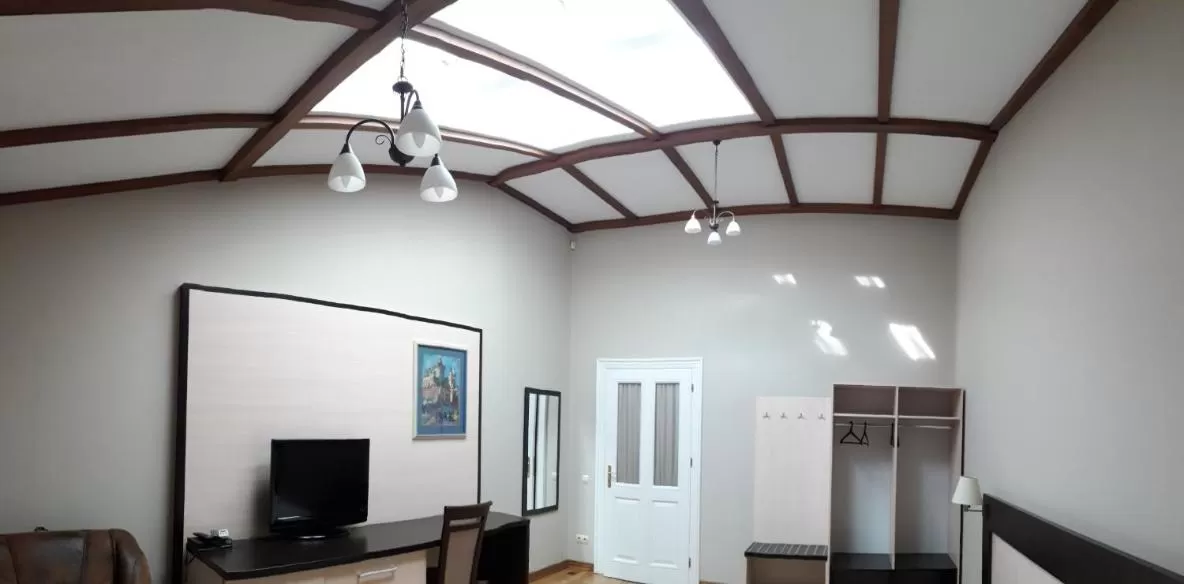 TV/Entertainment Center in Mini-Hotel Under The Roof