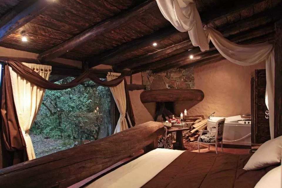 Bed in Hacienda Hostería Dos Chorreras